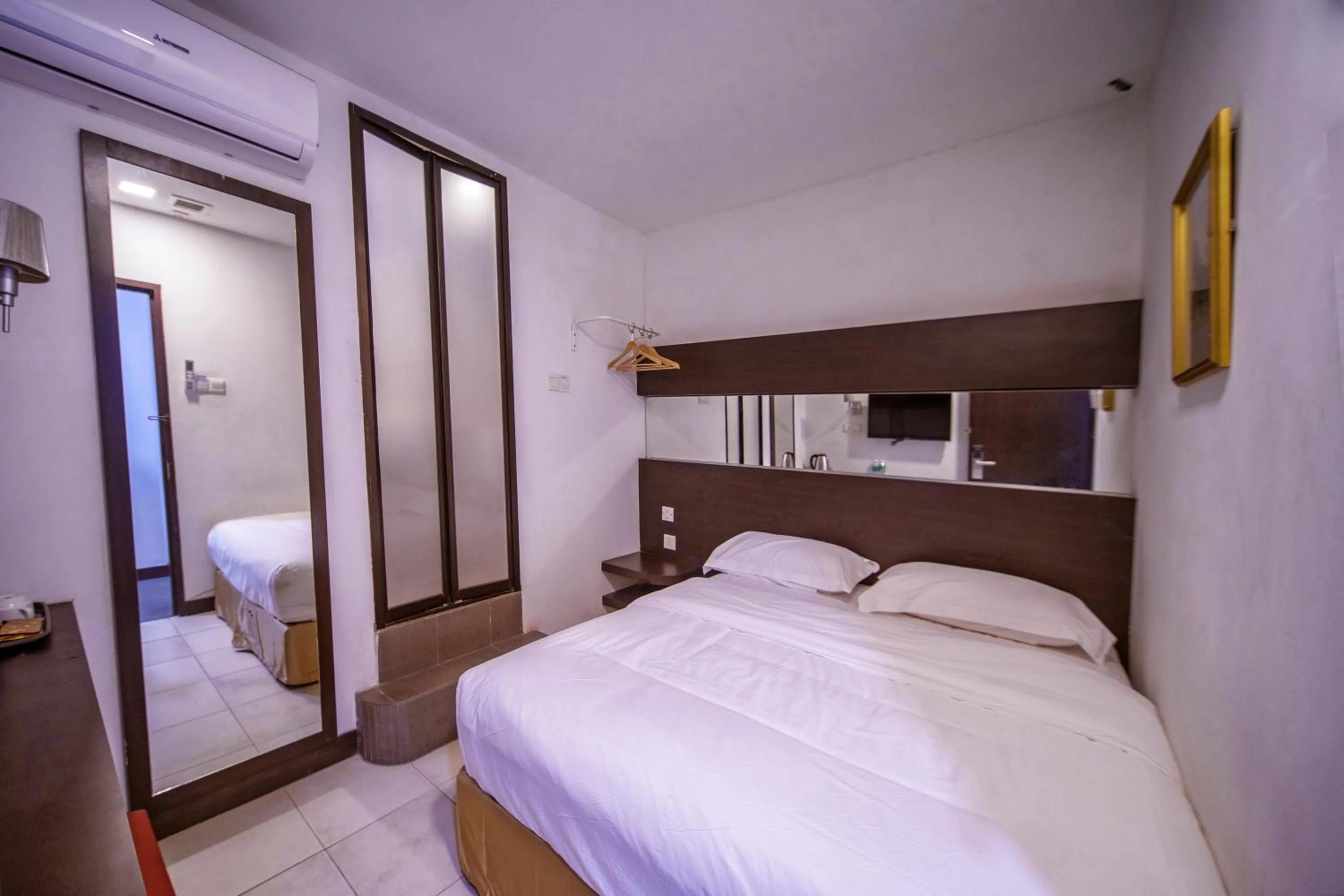 Bed in Uptown Chinatown