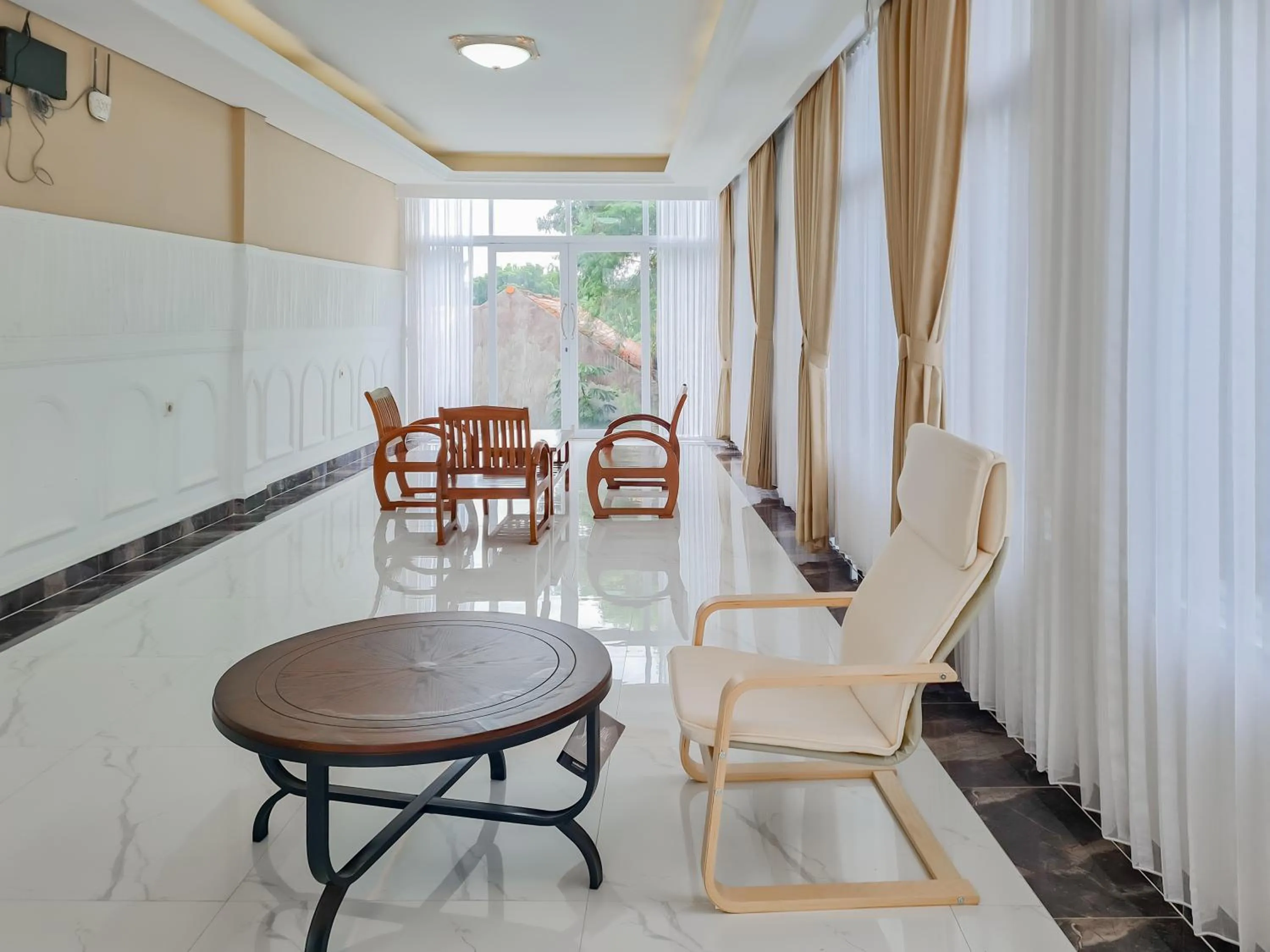 Living room in Sans Hotel Grand Sabaraya Cikampek