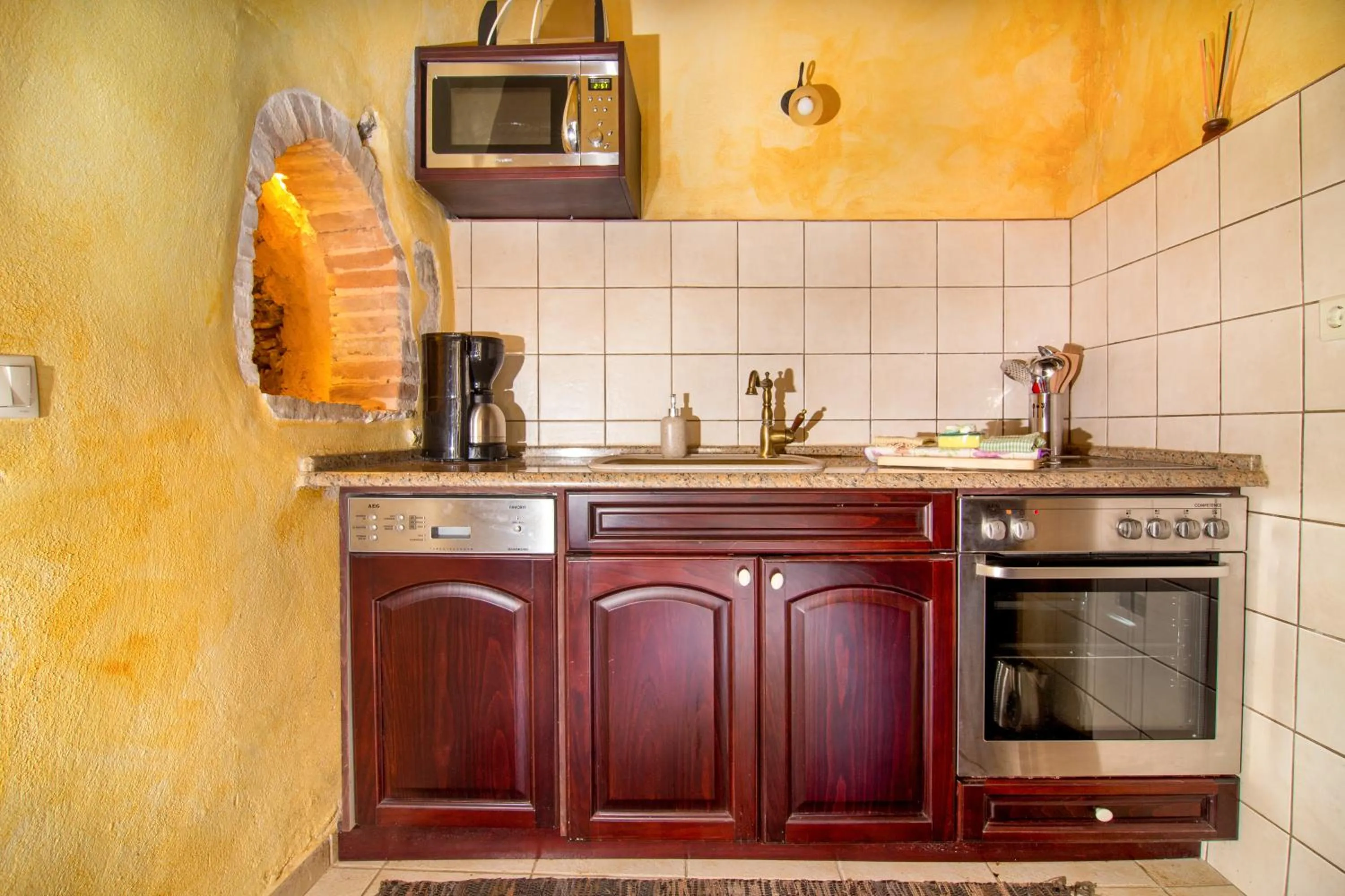 Kitchen or kitchenette in Samonas Traditional Villas