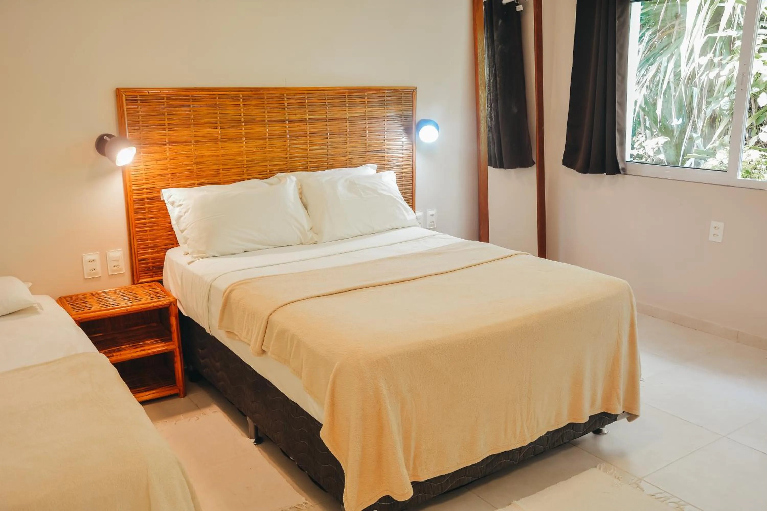 Bed in Ajubá Pousada