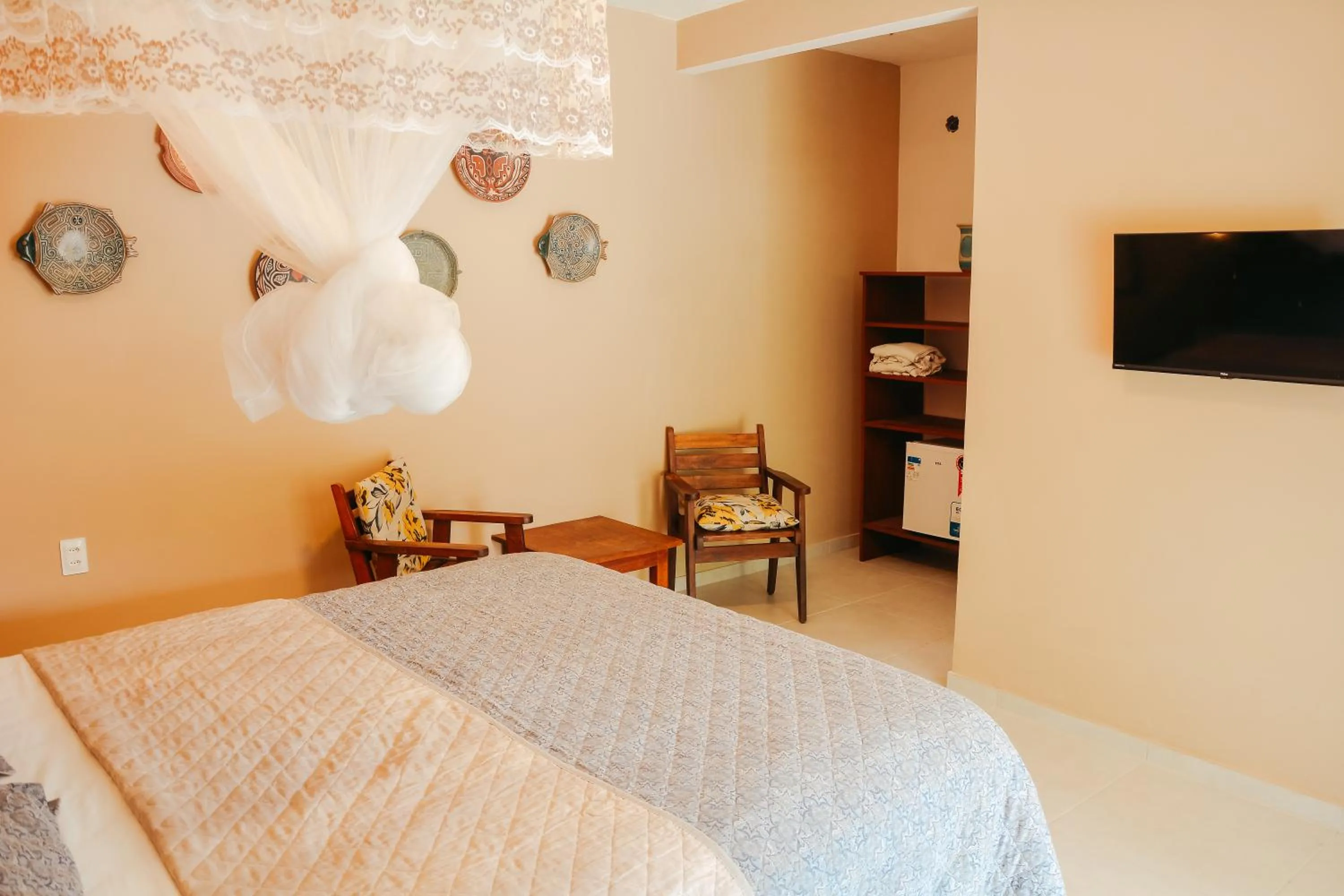 Bed in Ajubá Pousada