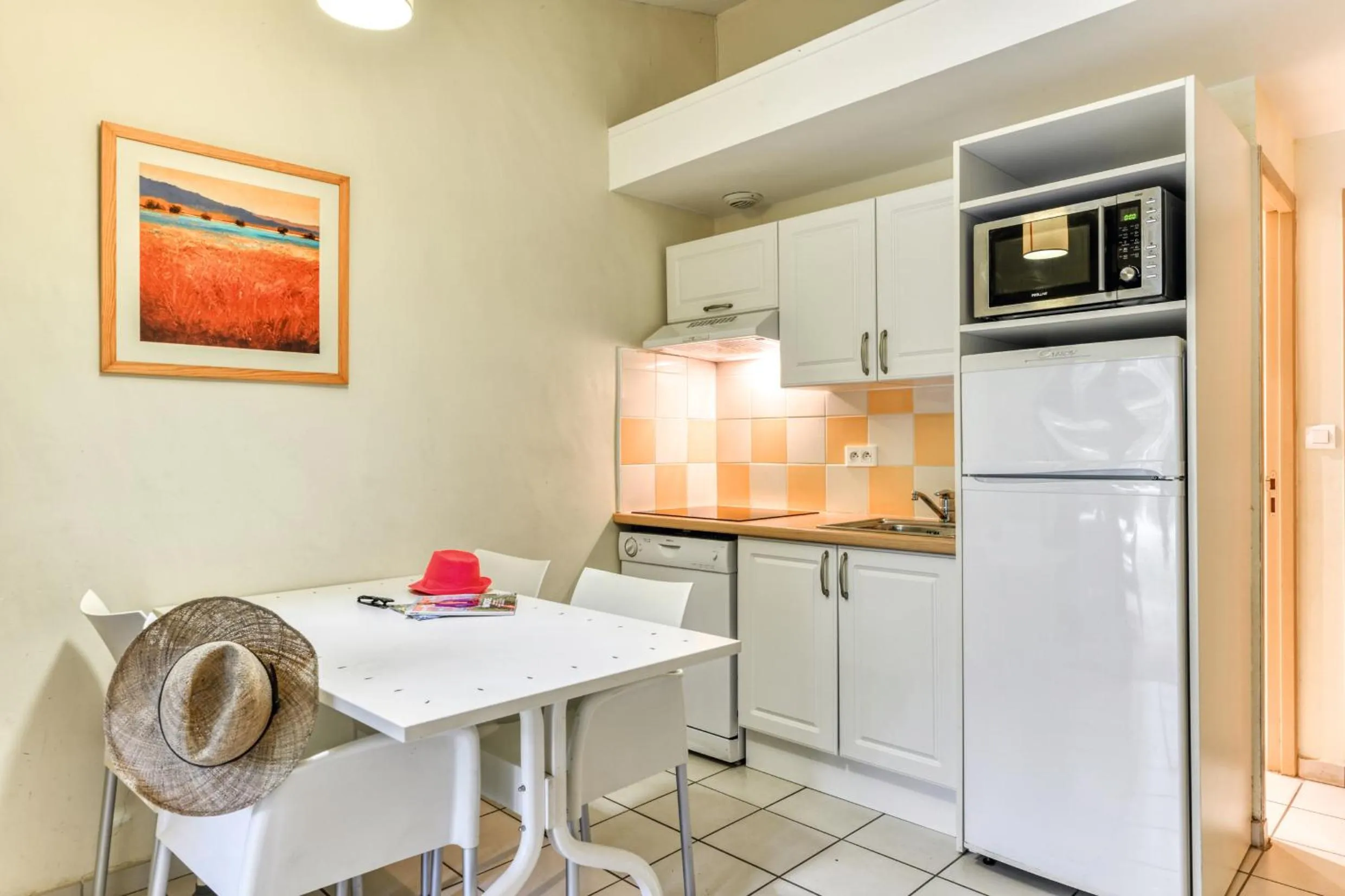 Kitchen or kitchenette in SOWELL Family Cap d’Agde