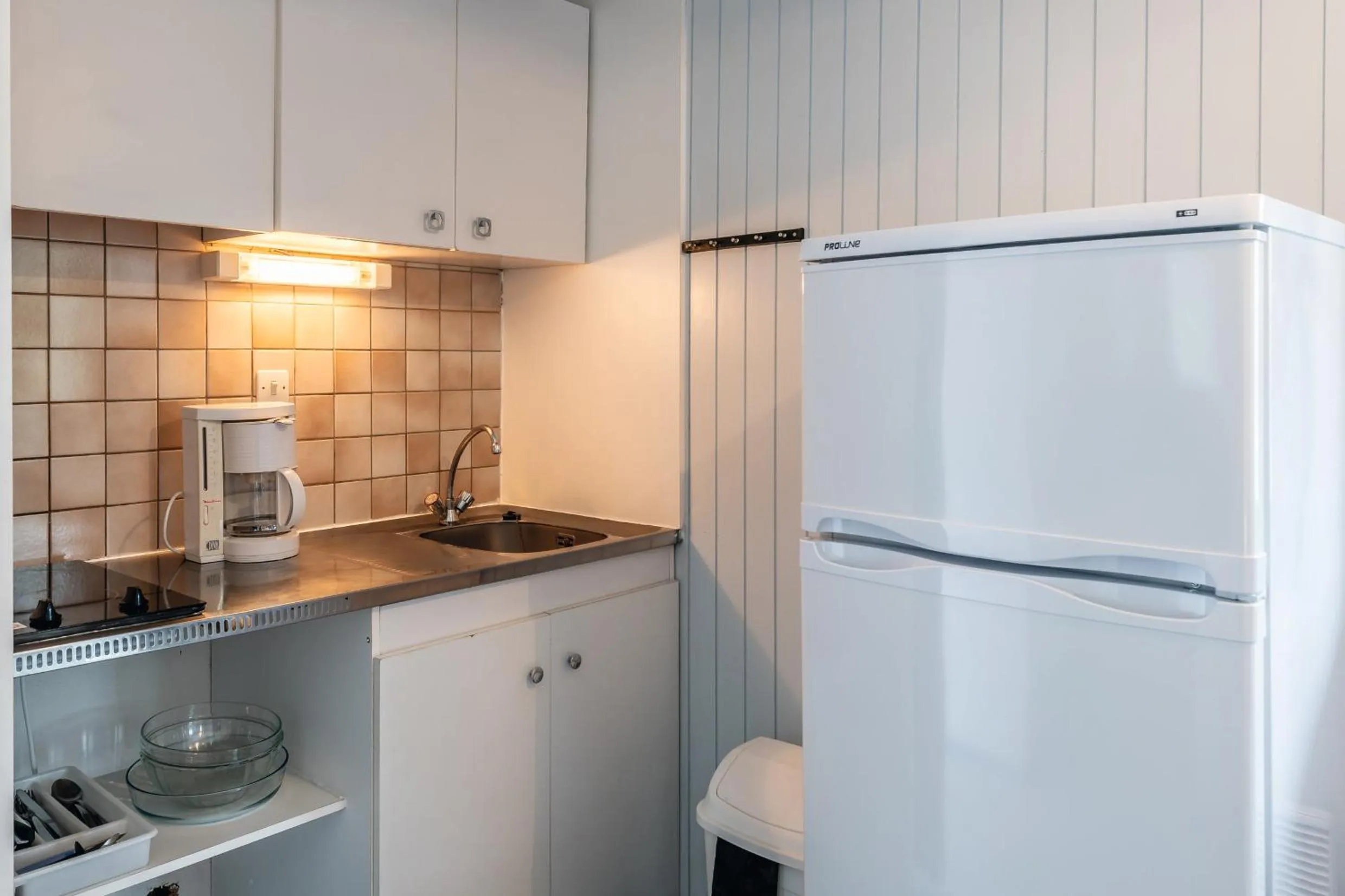 Kitchen or kitchenette in Résidence les Cavales