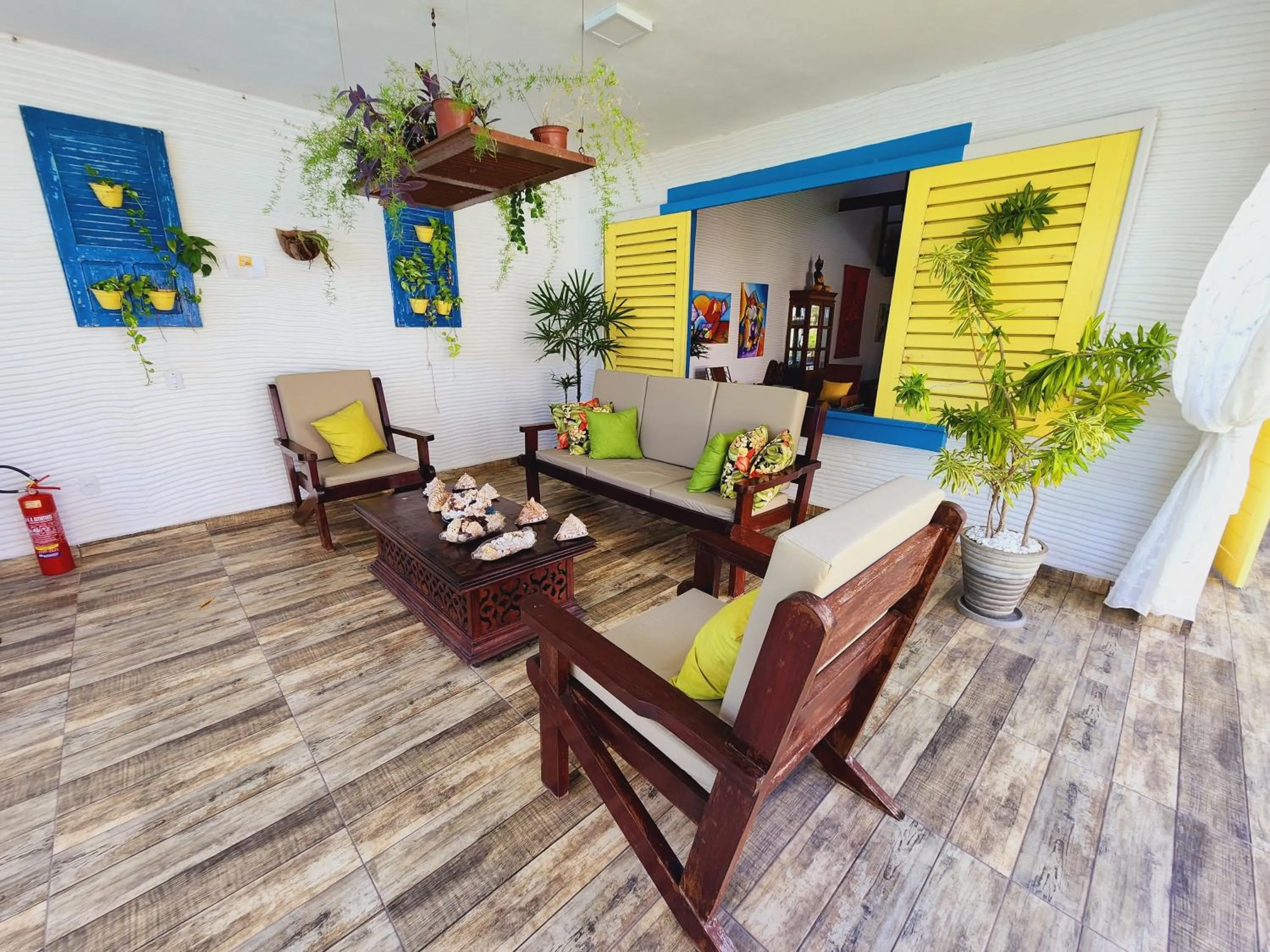 Seating area in Manaí Pousada & Beach Club