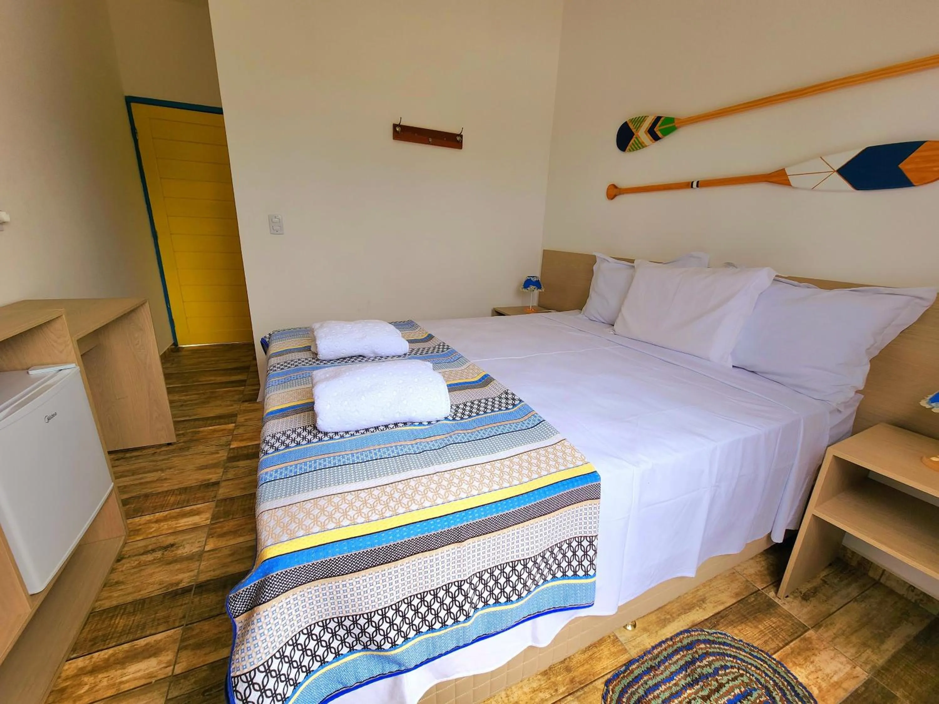 Bed in Manaí Pousada & Beach Club