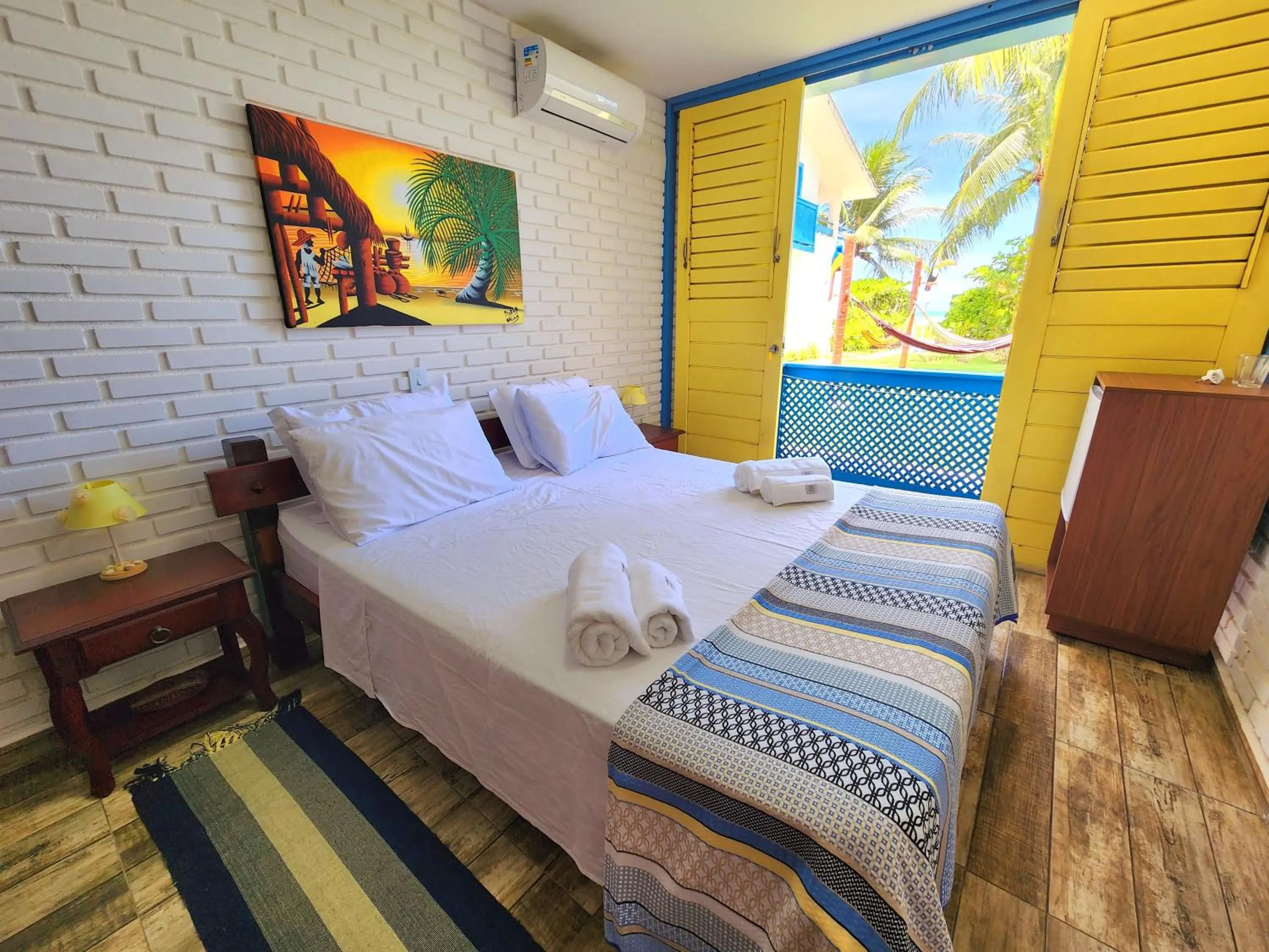 Bed in Manaí Pousada & Beach Club