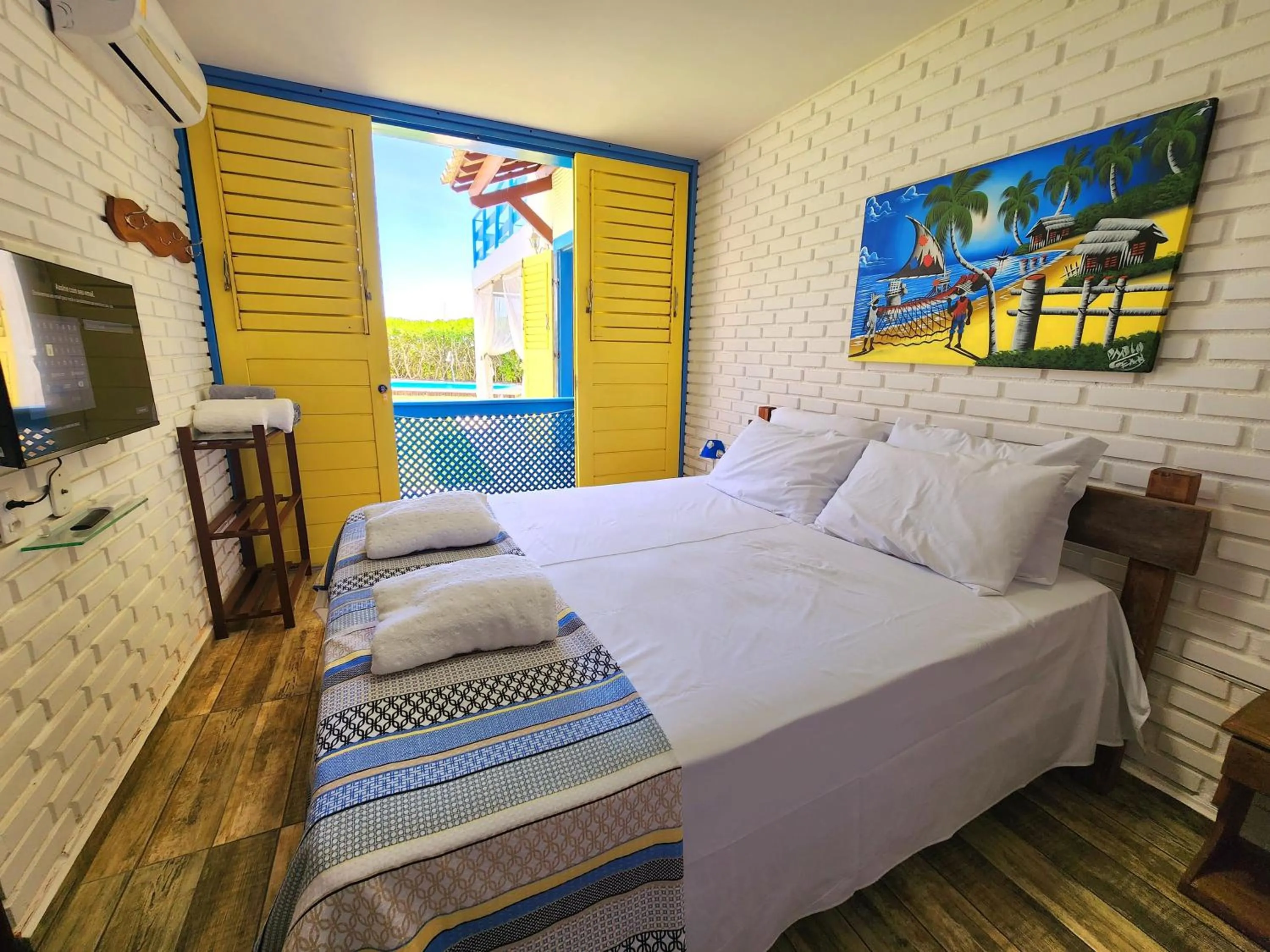 Bed in Manaí Pousada & Beach Club