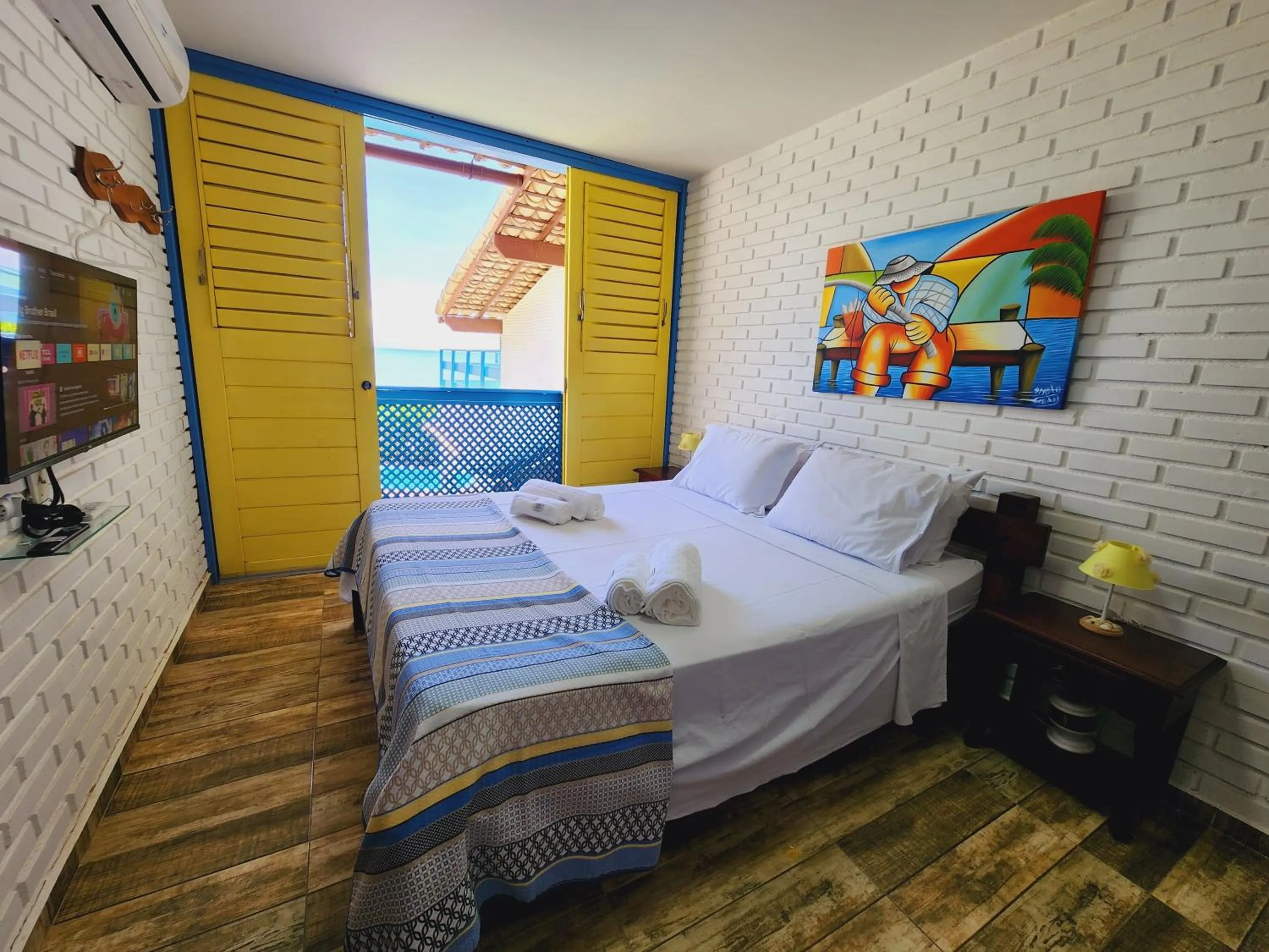 Bed in Manaí Pousada & Beach Club