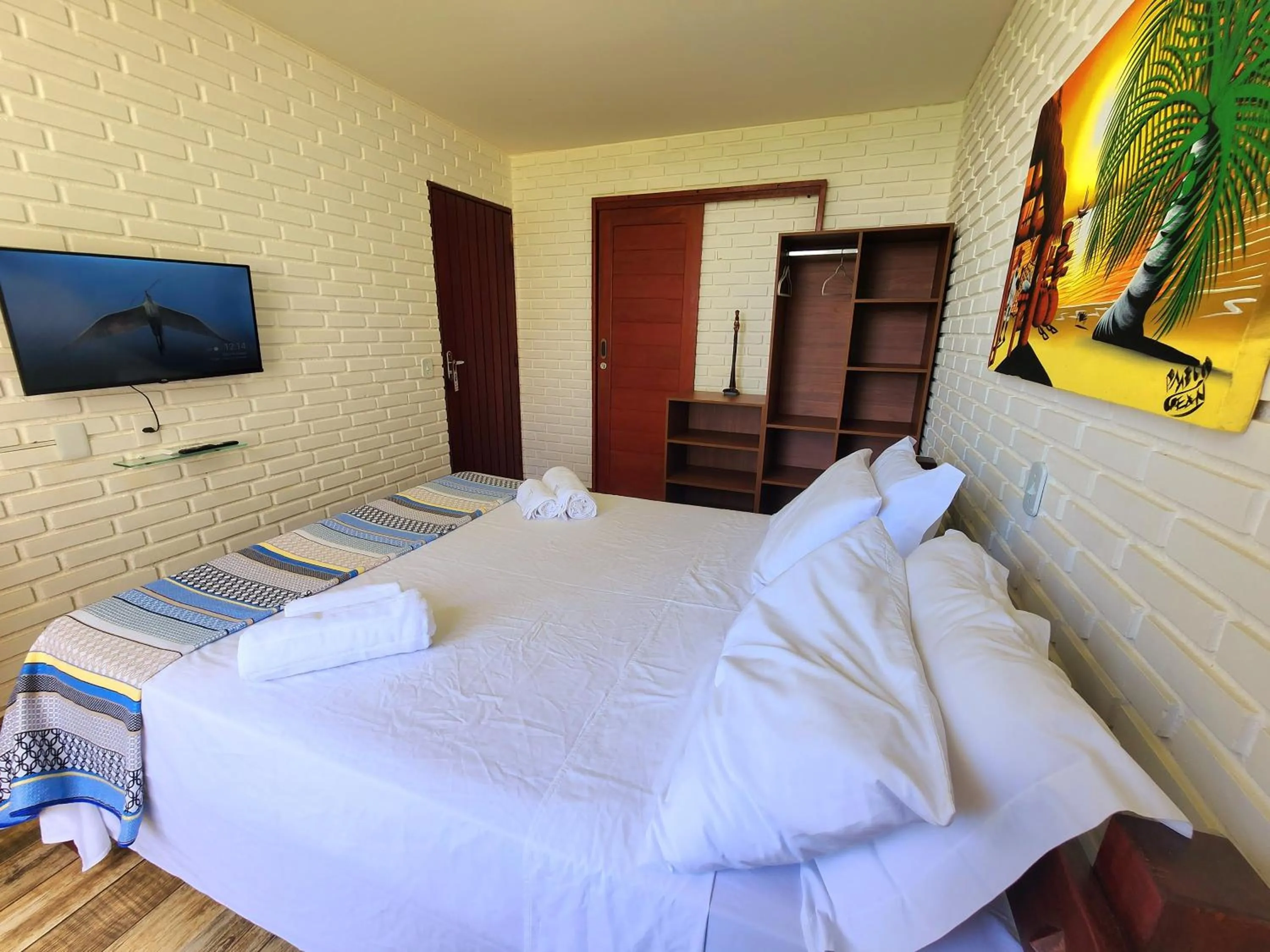 Bed in Manaí Pousada & Beach Club