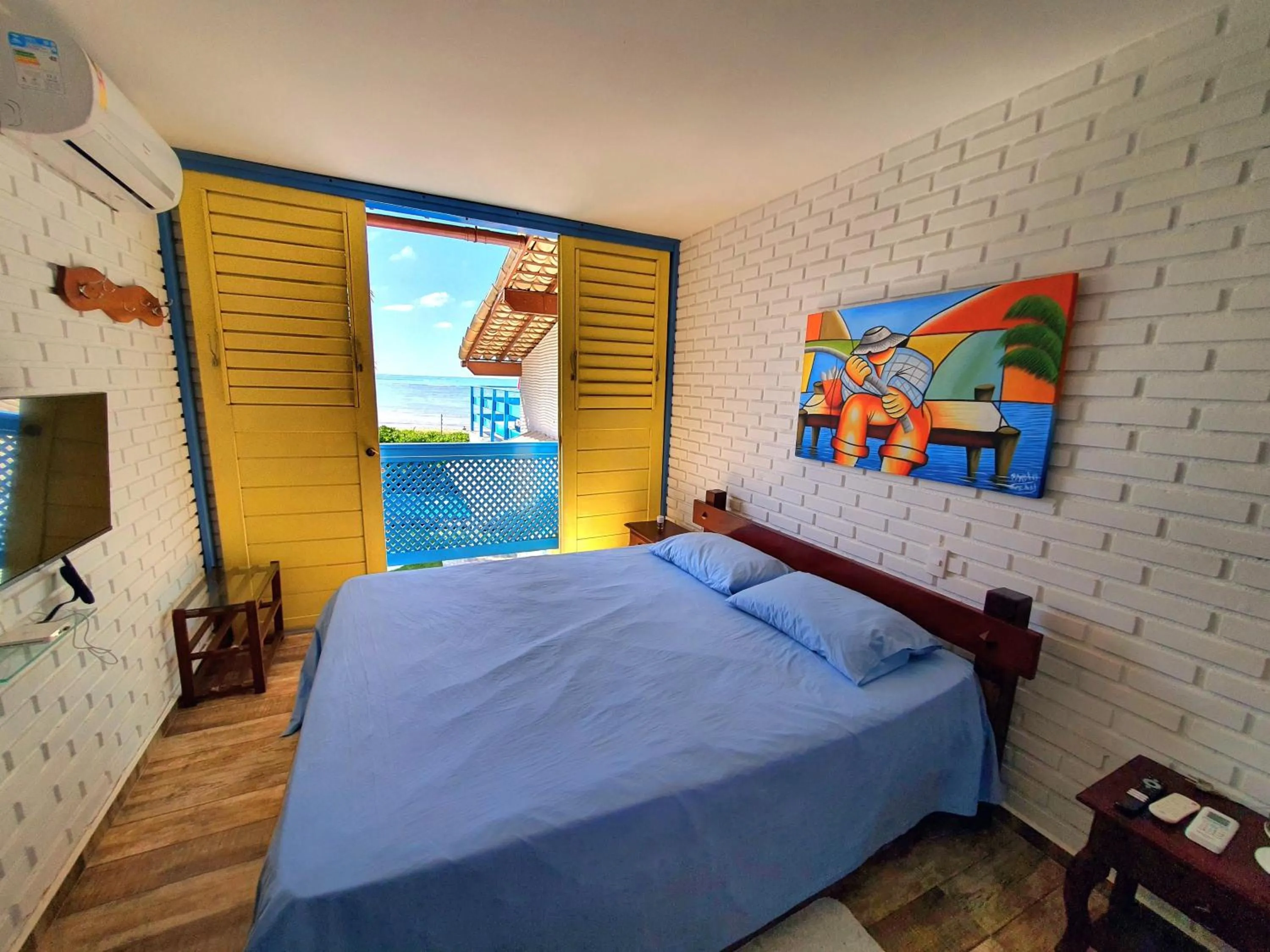 Bed in Manaí Pousada & Beach Club