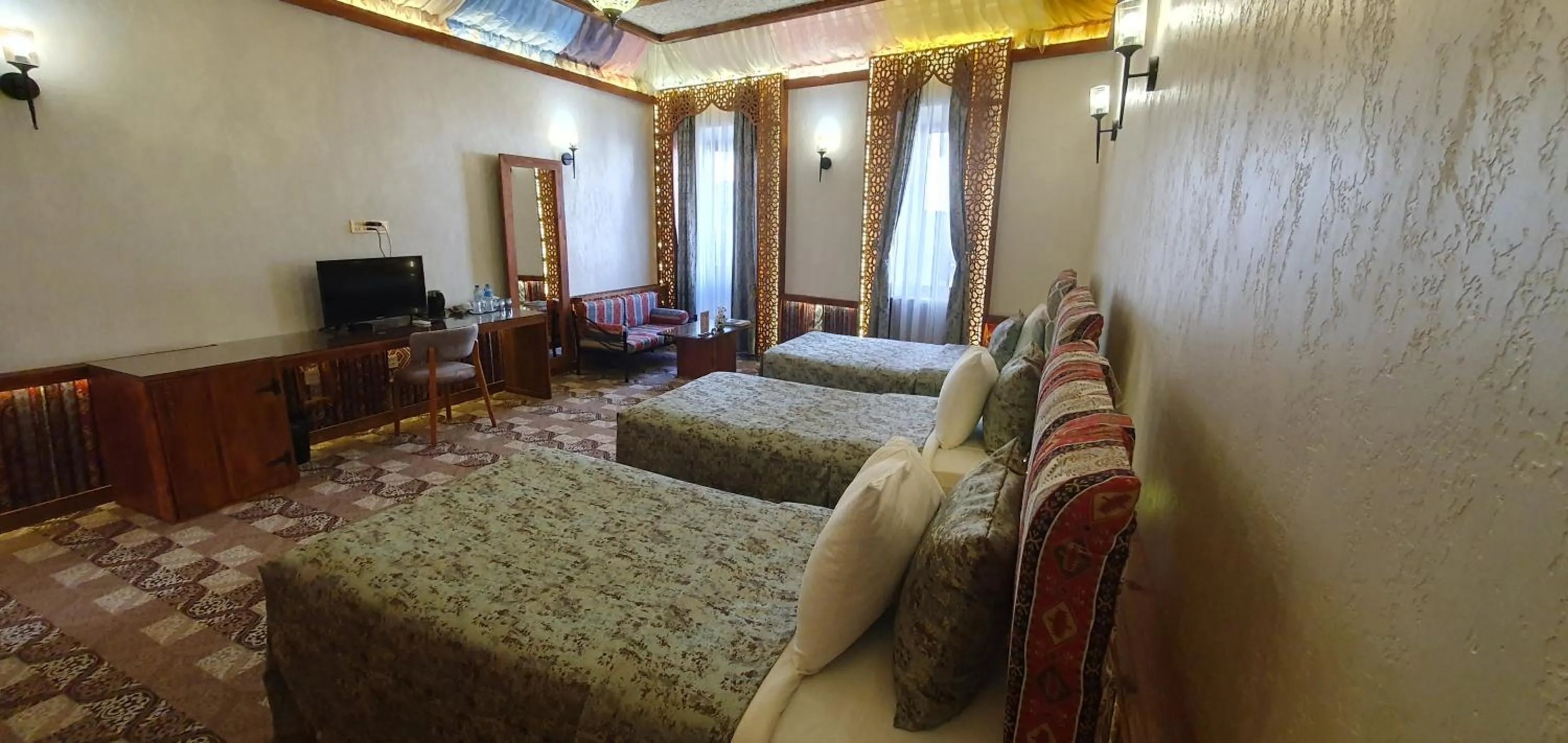 Communal lounge/ TV room, Bed in Qiz Galasi Hotel Baku