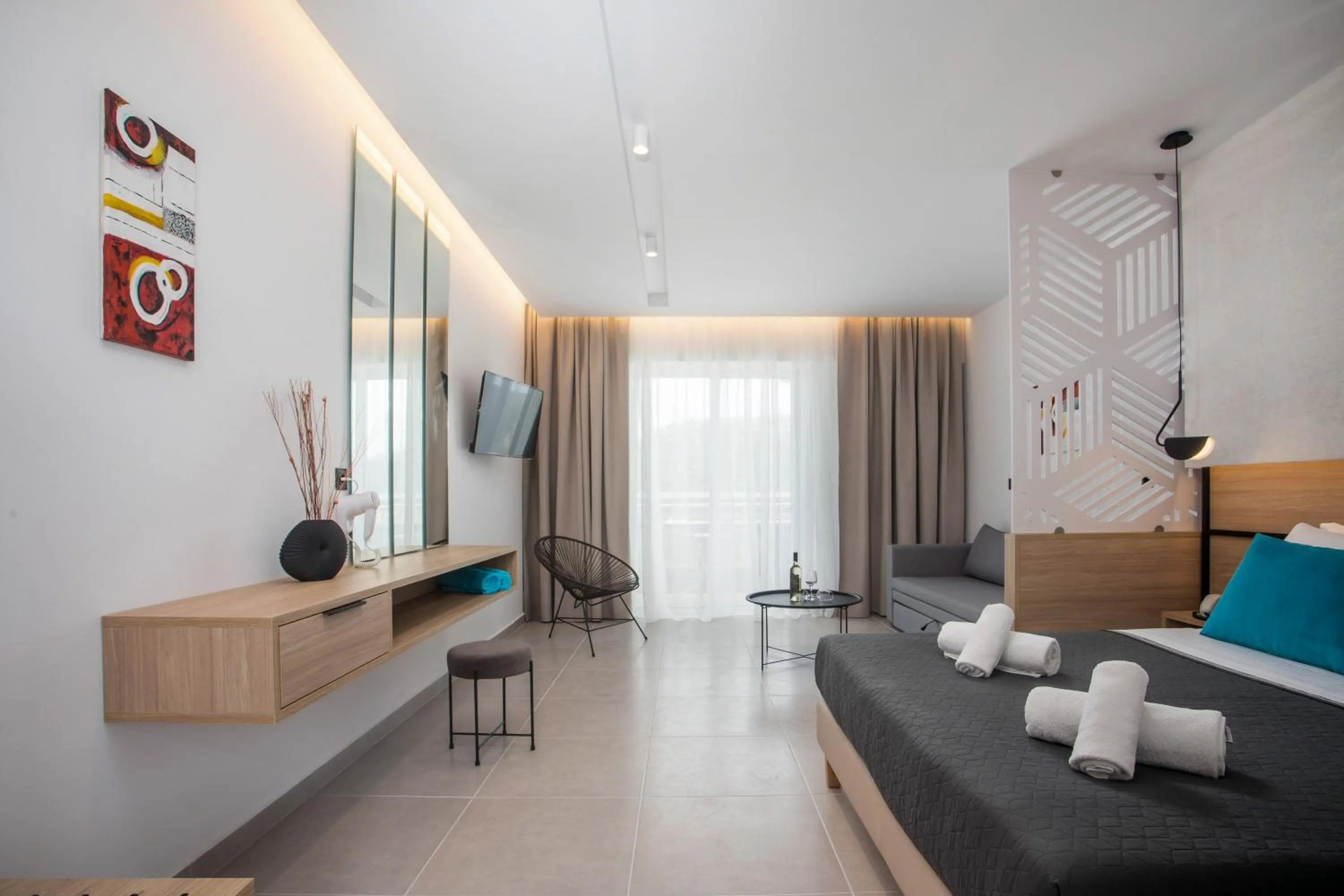 Bed in Zoes Hotel & Suites