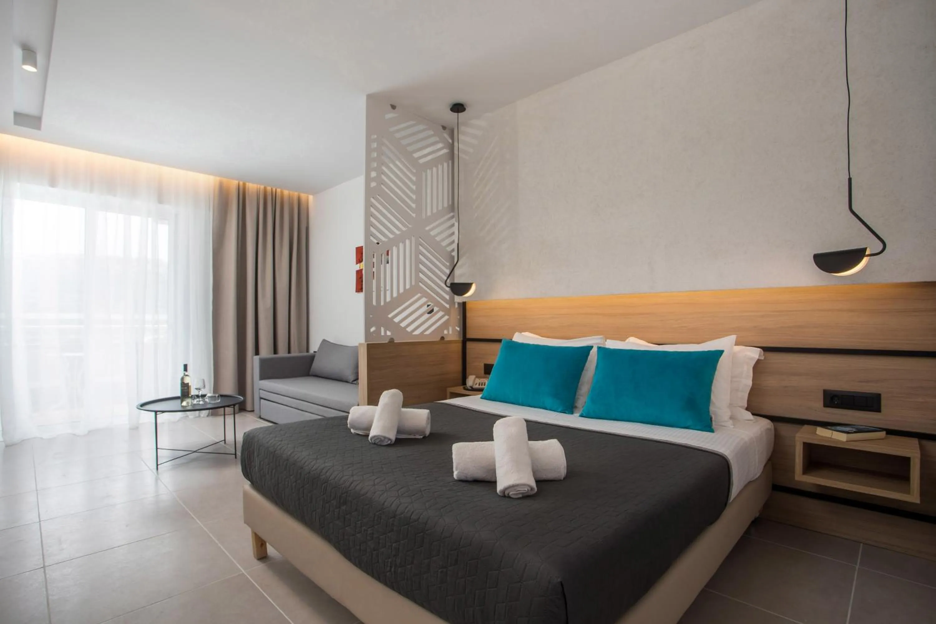 Bed in Zoes Hotel & Suites