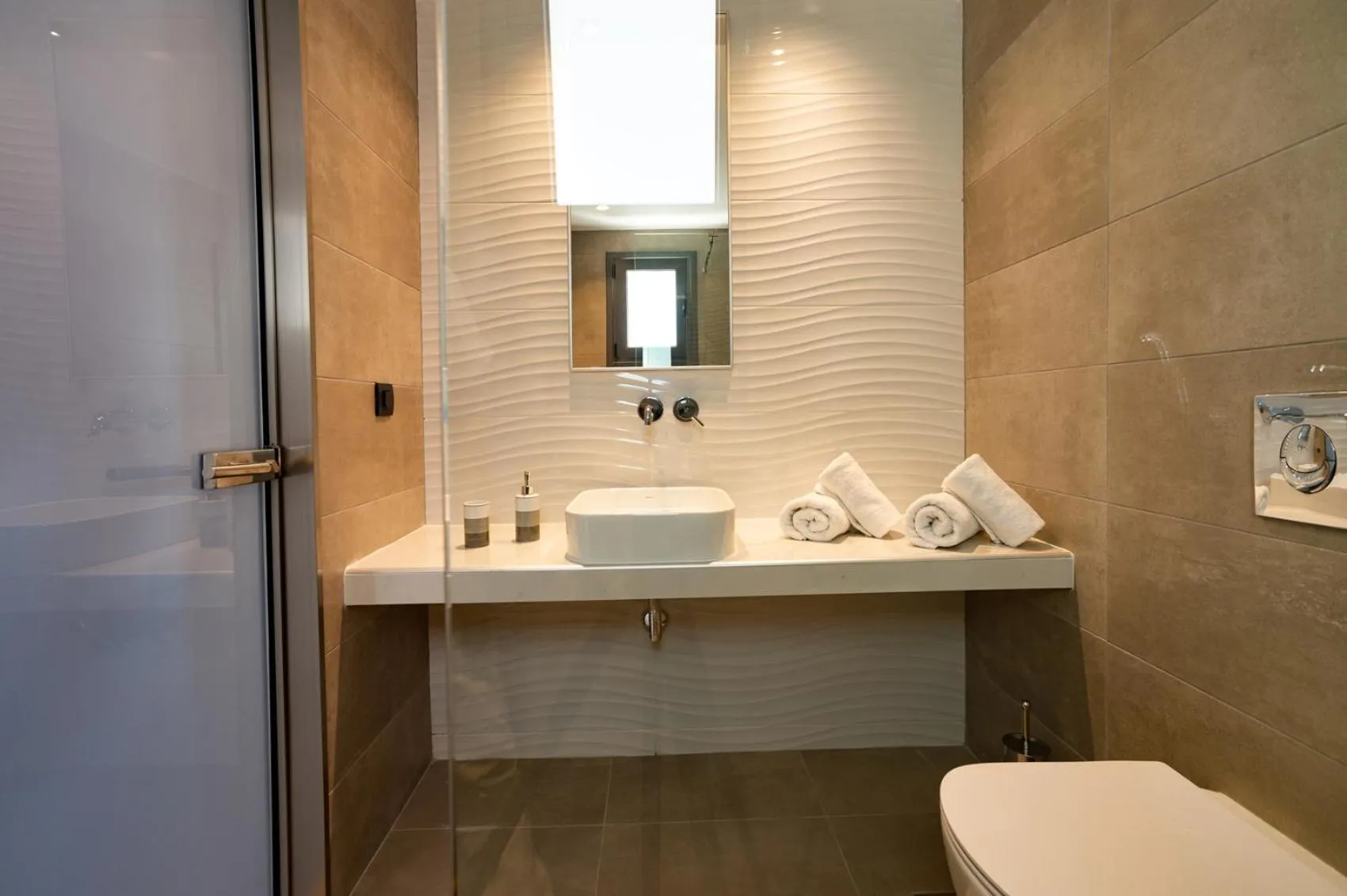Bathroom in Zoes Hotel & Suites