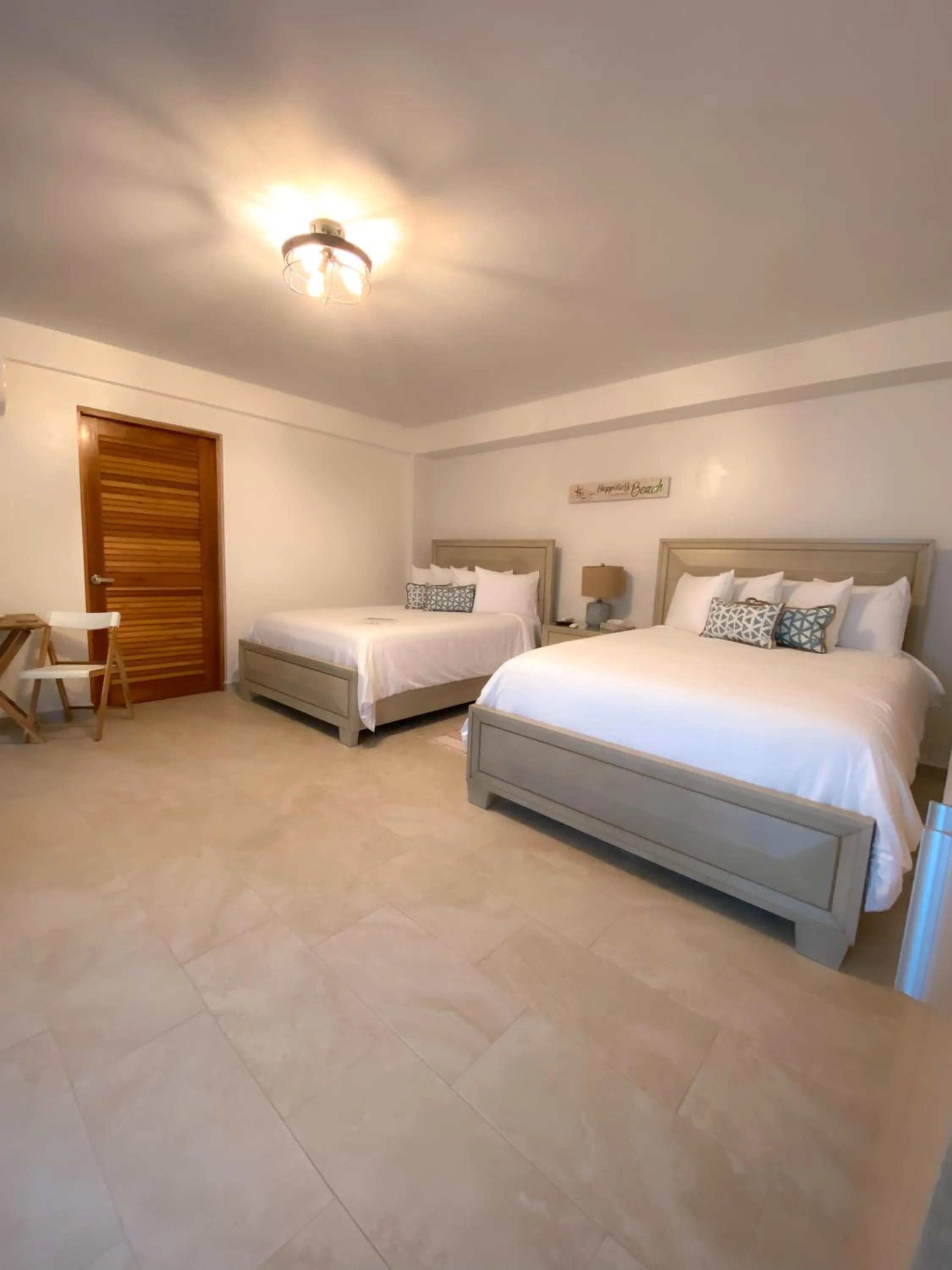 Photo of the whole room, Bed in Tres Palmas Boutique Hotel
