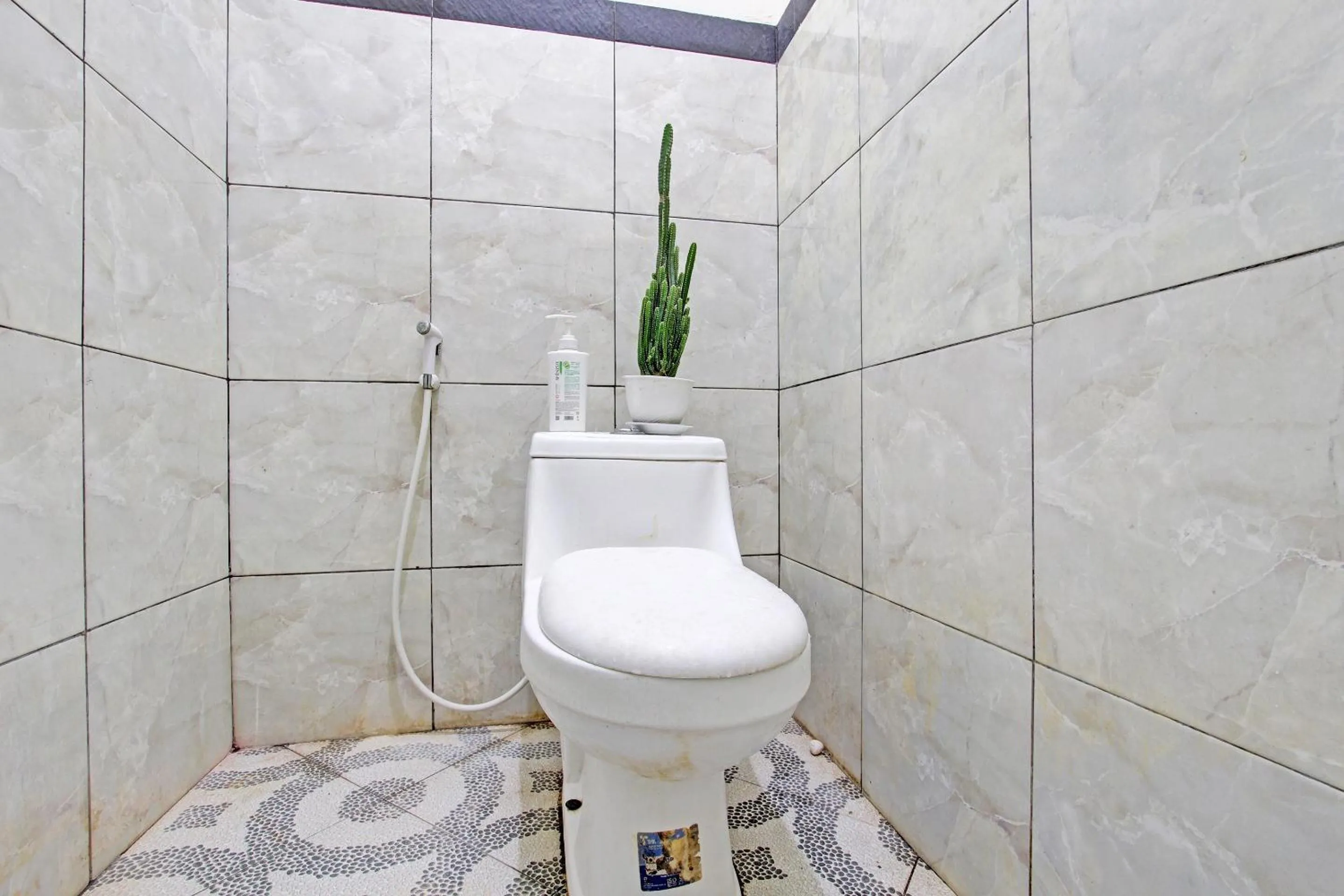 Bathroom in OYO Life 92184 Mr Brown Homestay