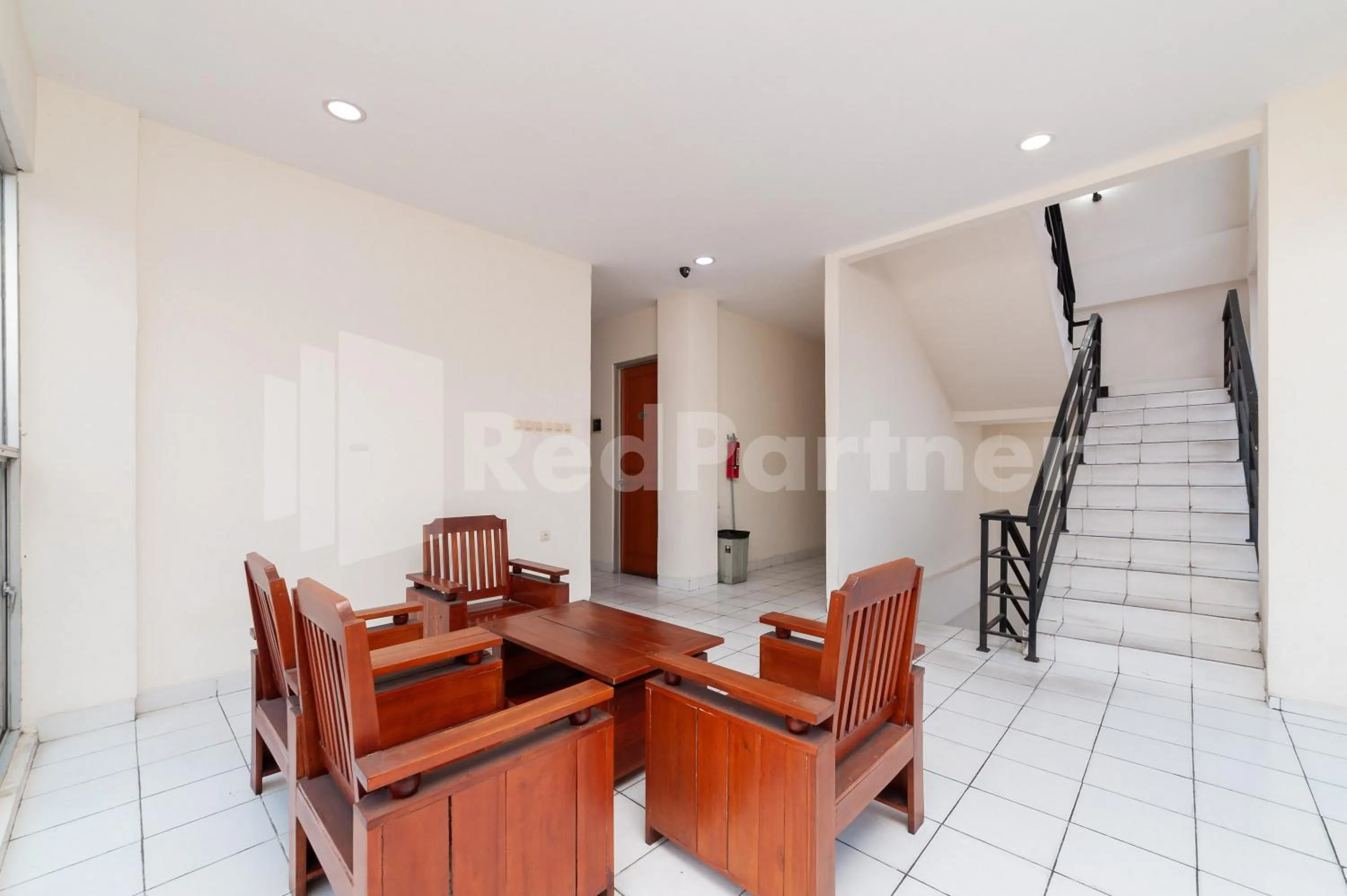 Living room in Orange Garden 47 Mitra RedDoorz