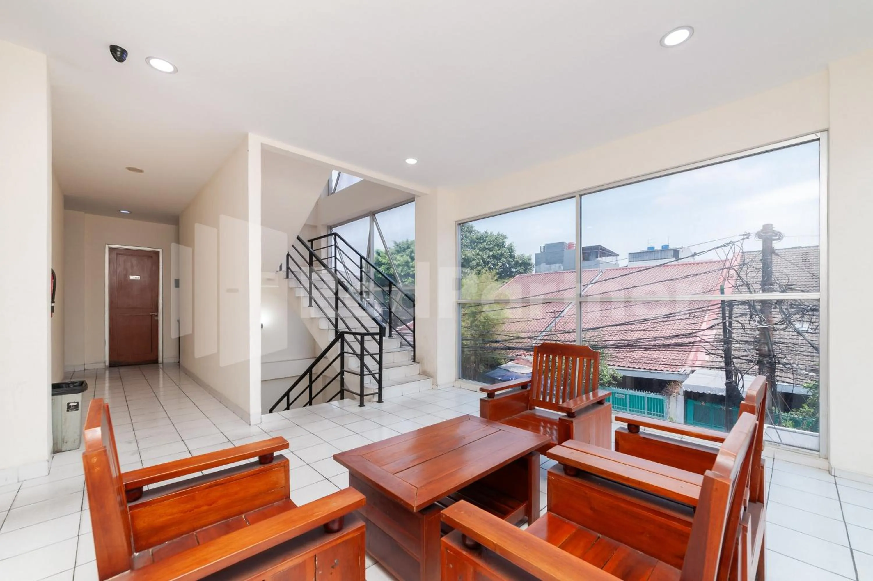 Living room in Orange Garden 47 Mitra RedDoorz