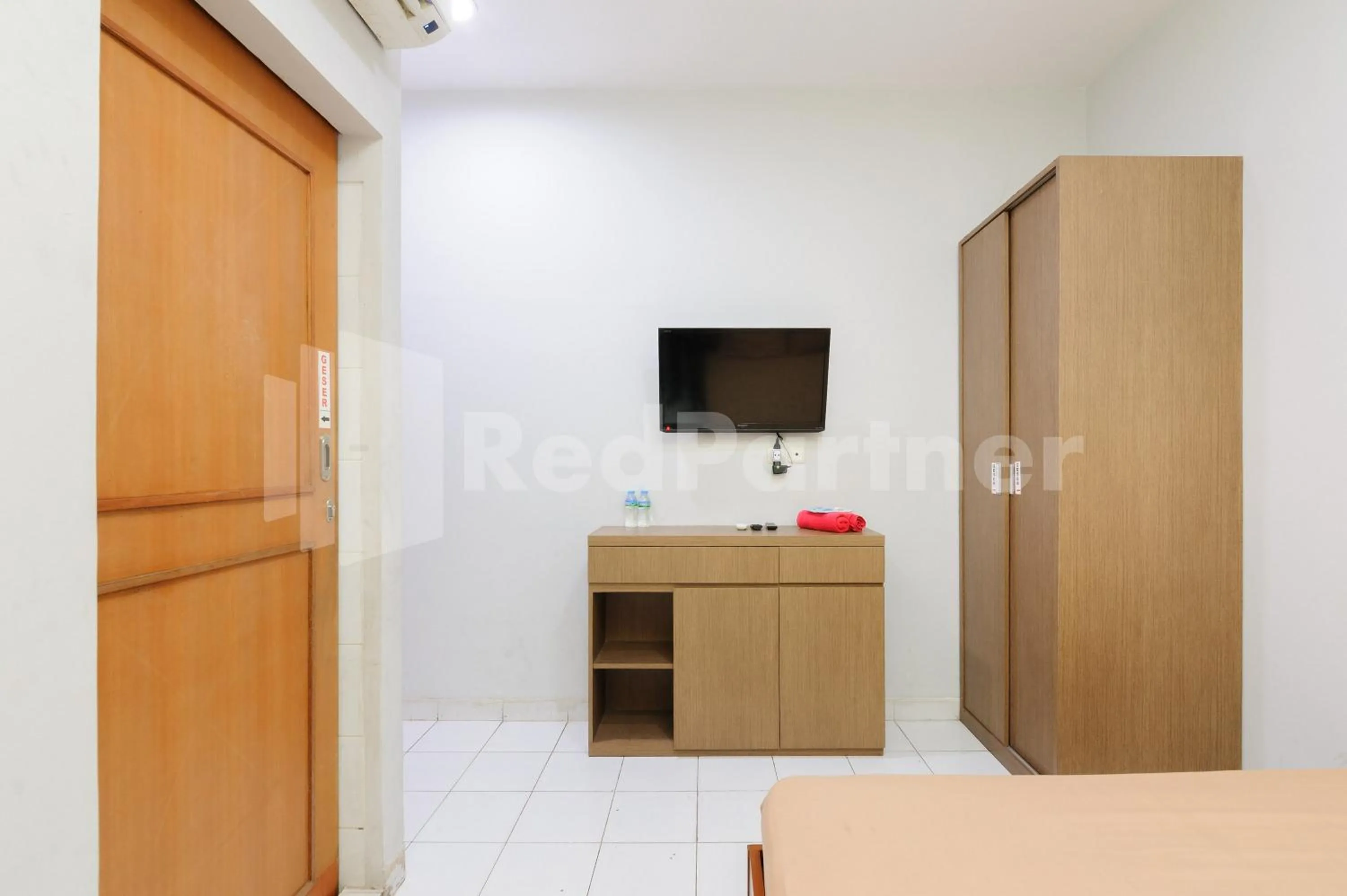 TV and multimedia in Orange Garden 47 Mitra RedDoorz