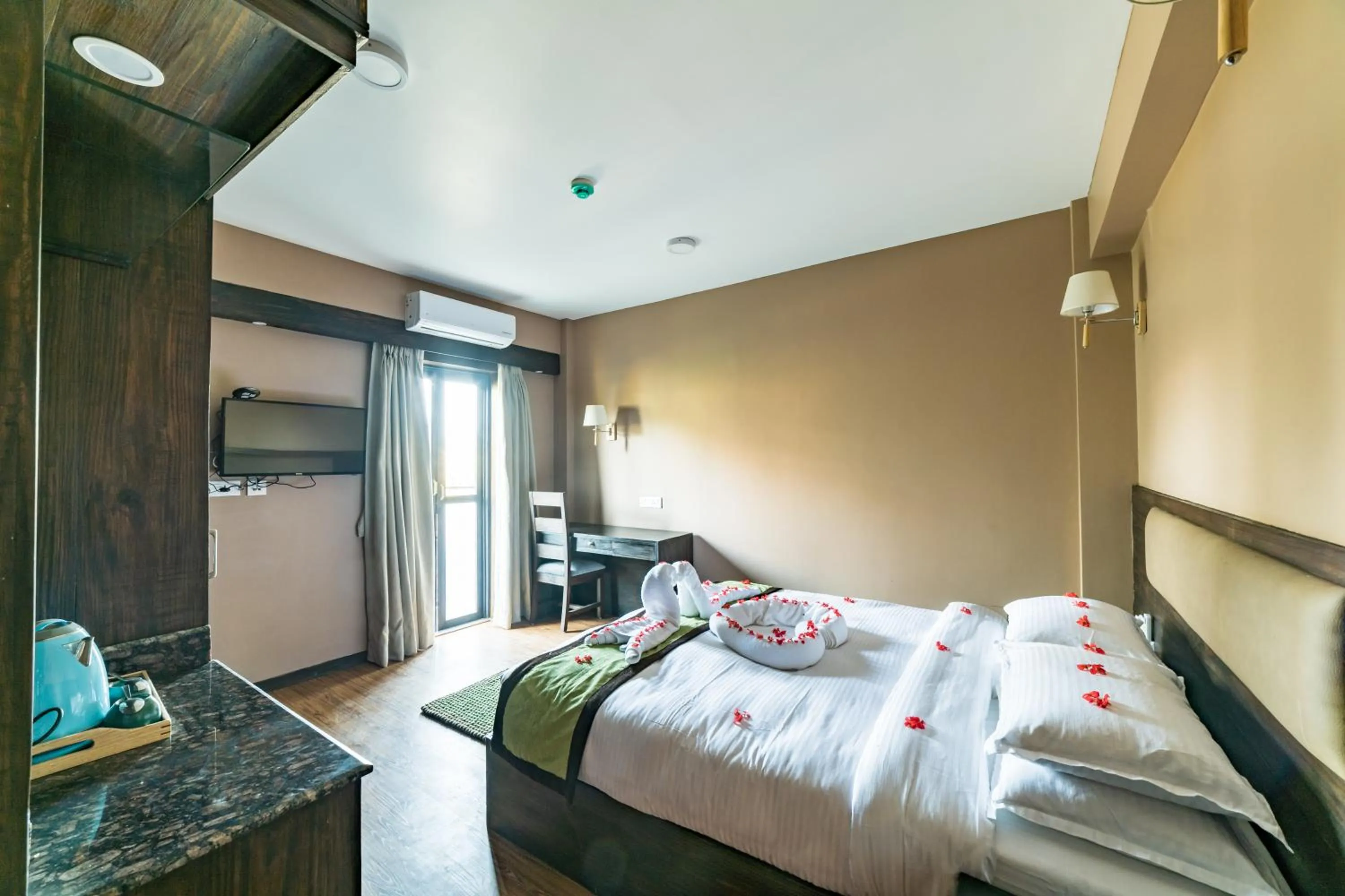 Bed in Purna's Museum Resort