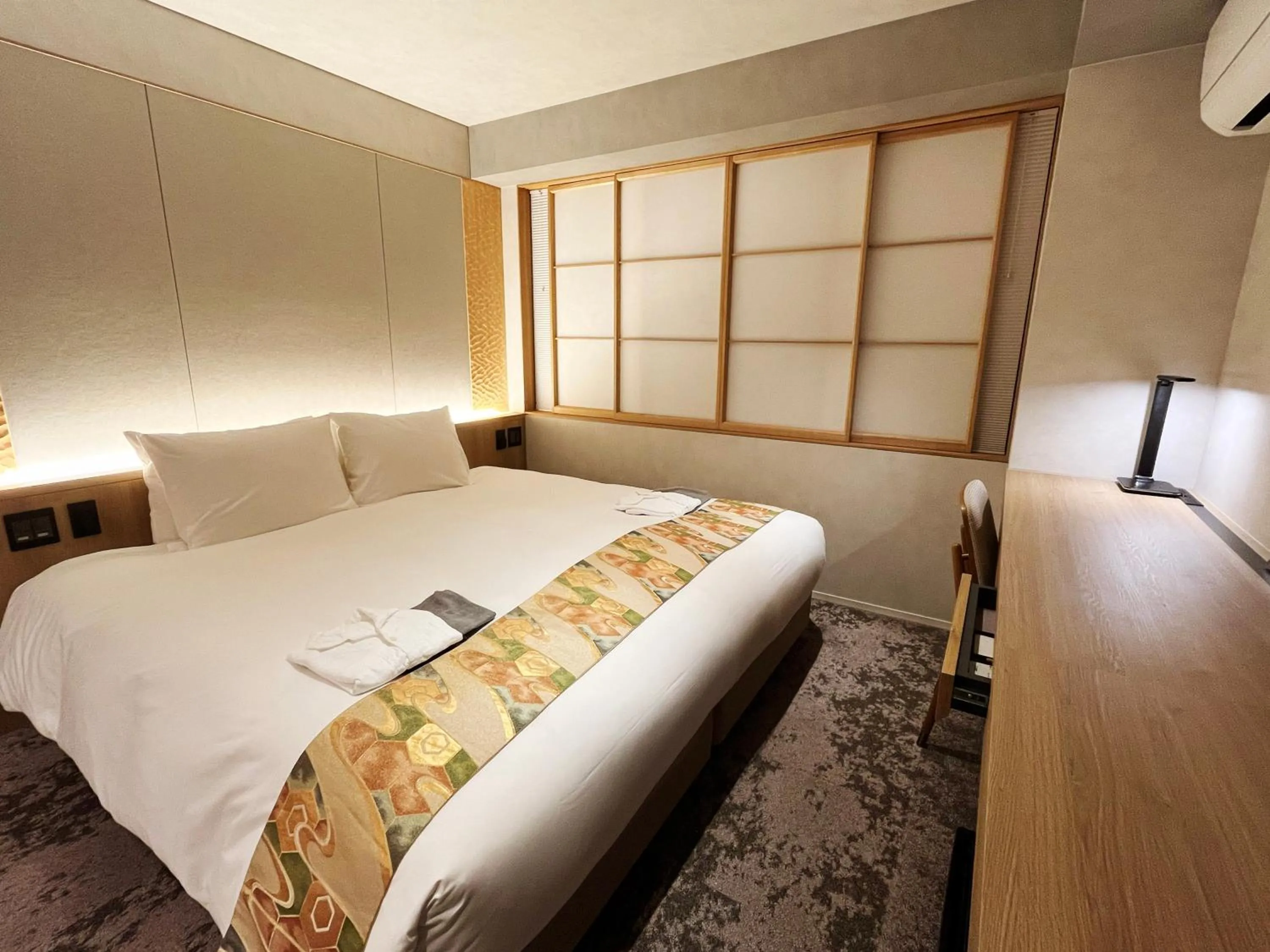 Bed in Miru Kyoto Gion