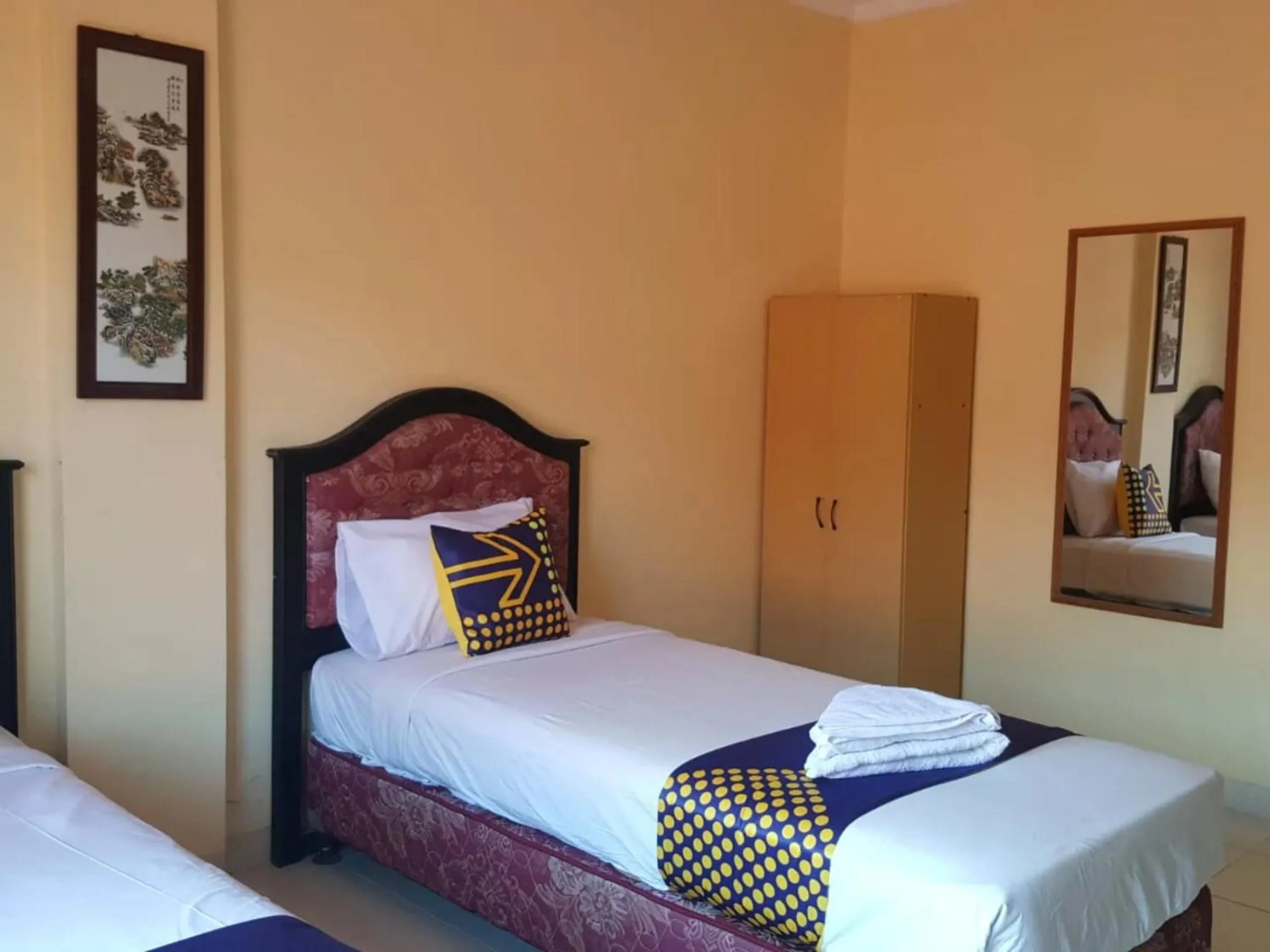 Bed in The Ellen Hotel by ecommerceloka