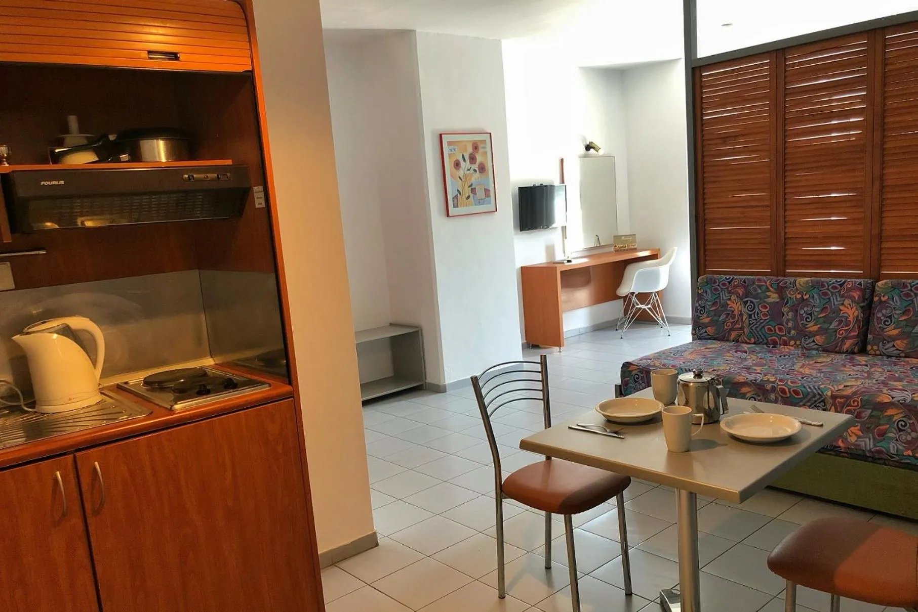 Kitchen or kitchenette in Caravel Hotel Apartments