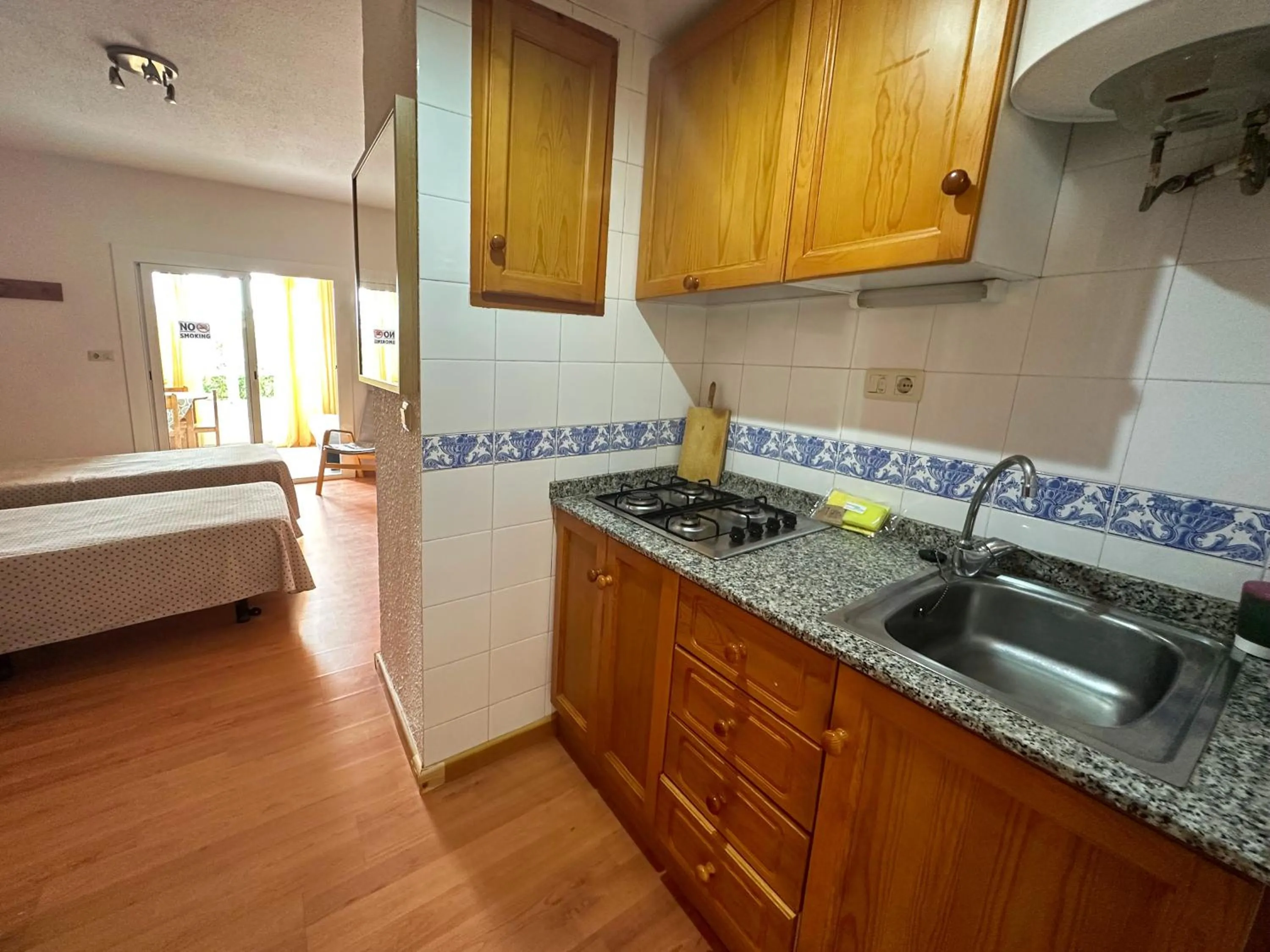 Kitchen or kitchenette in Apartamentos Sol y Luna 3000