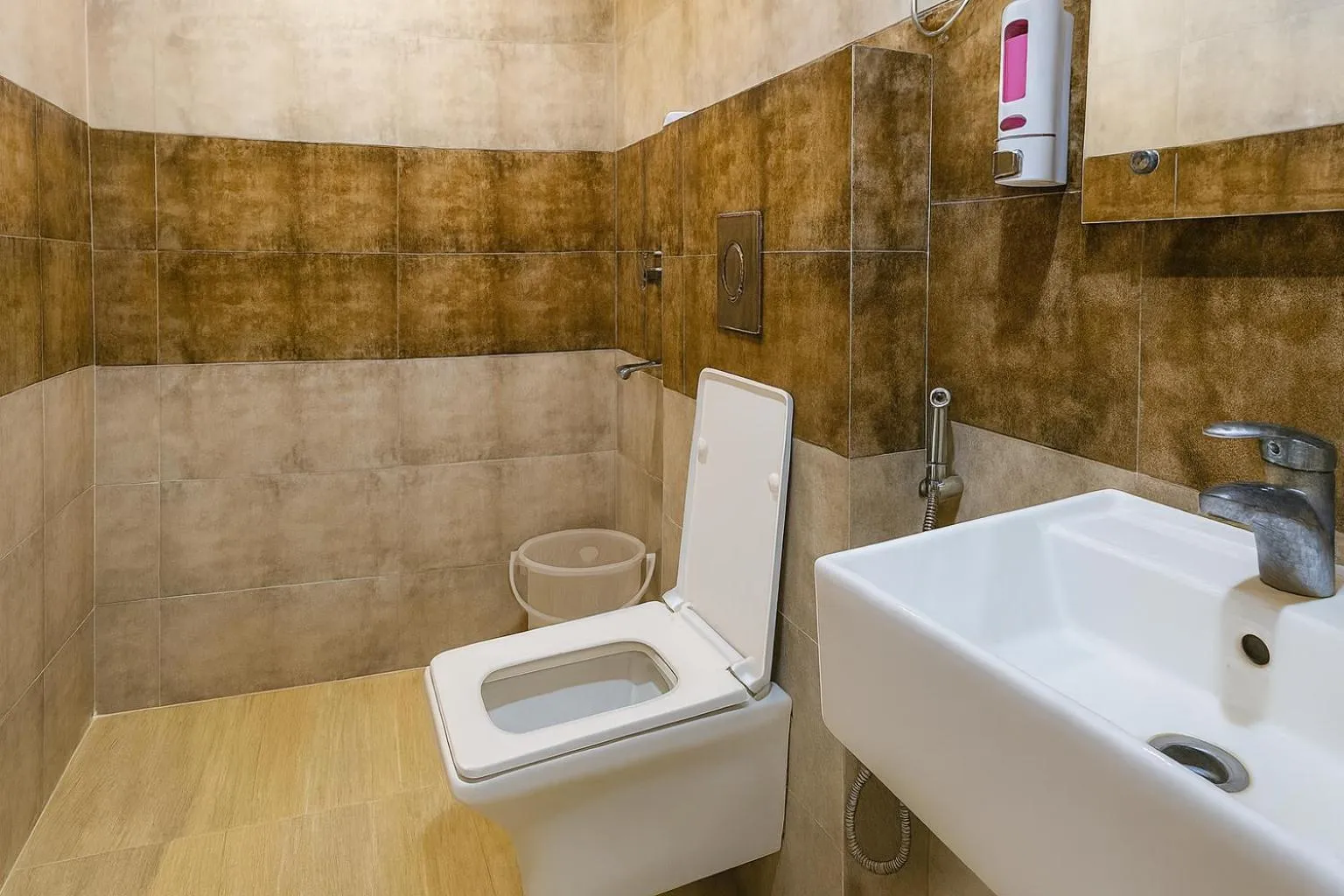 Toilet in Hotel Good Luck by JMD Group