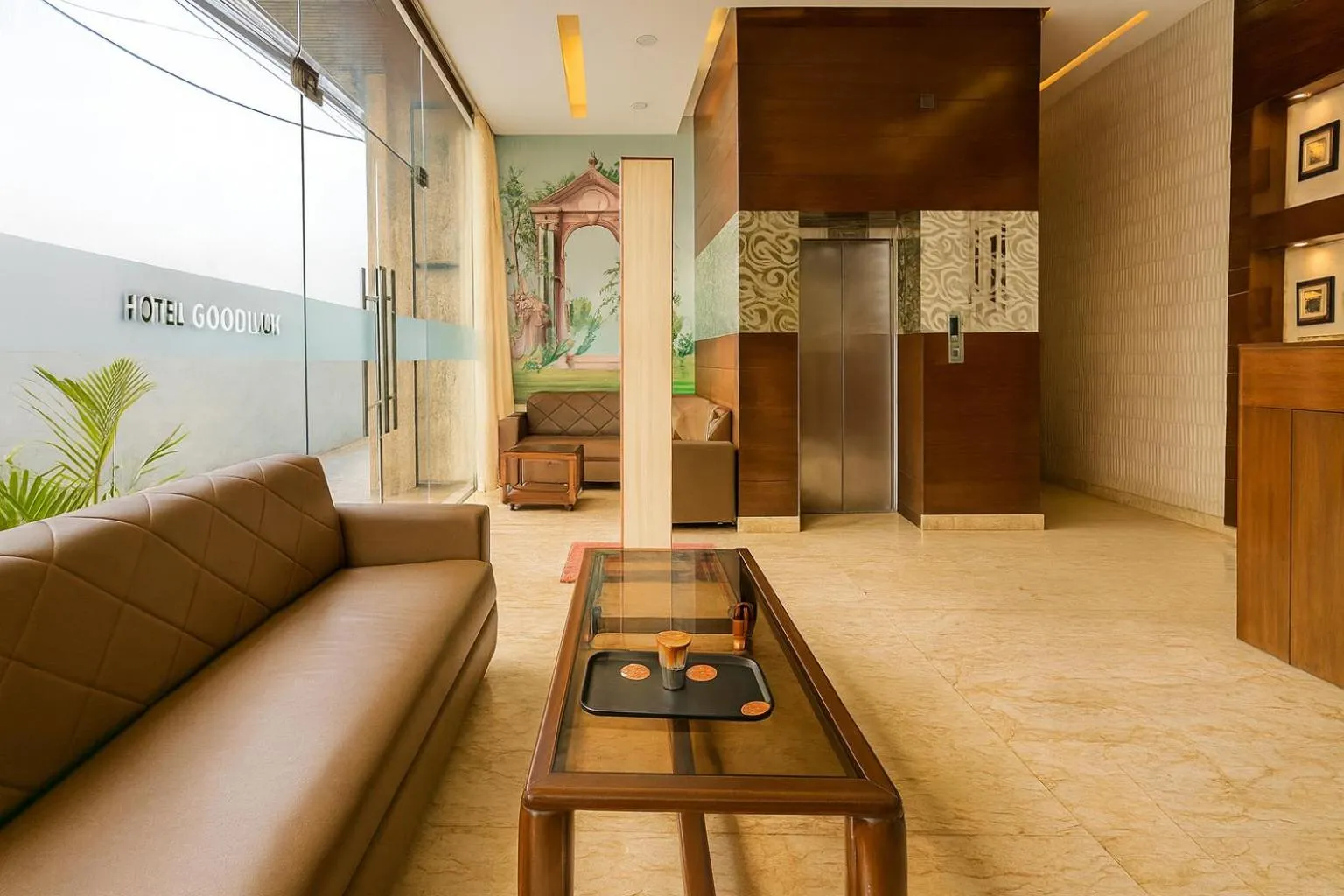 Seating area in Hotel Good Luck by JMD Group