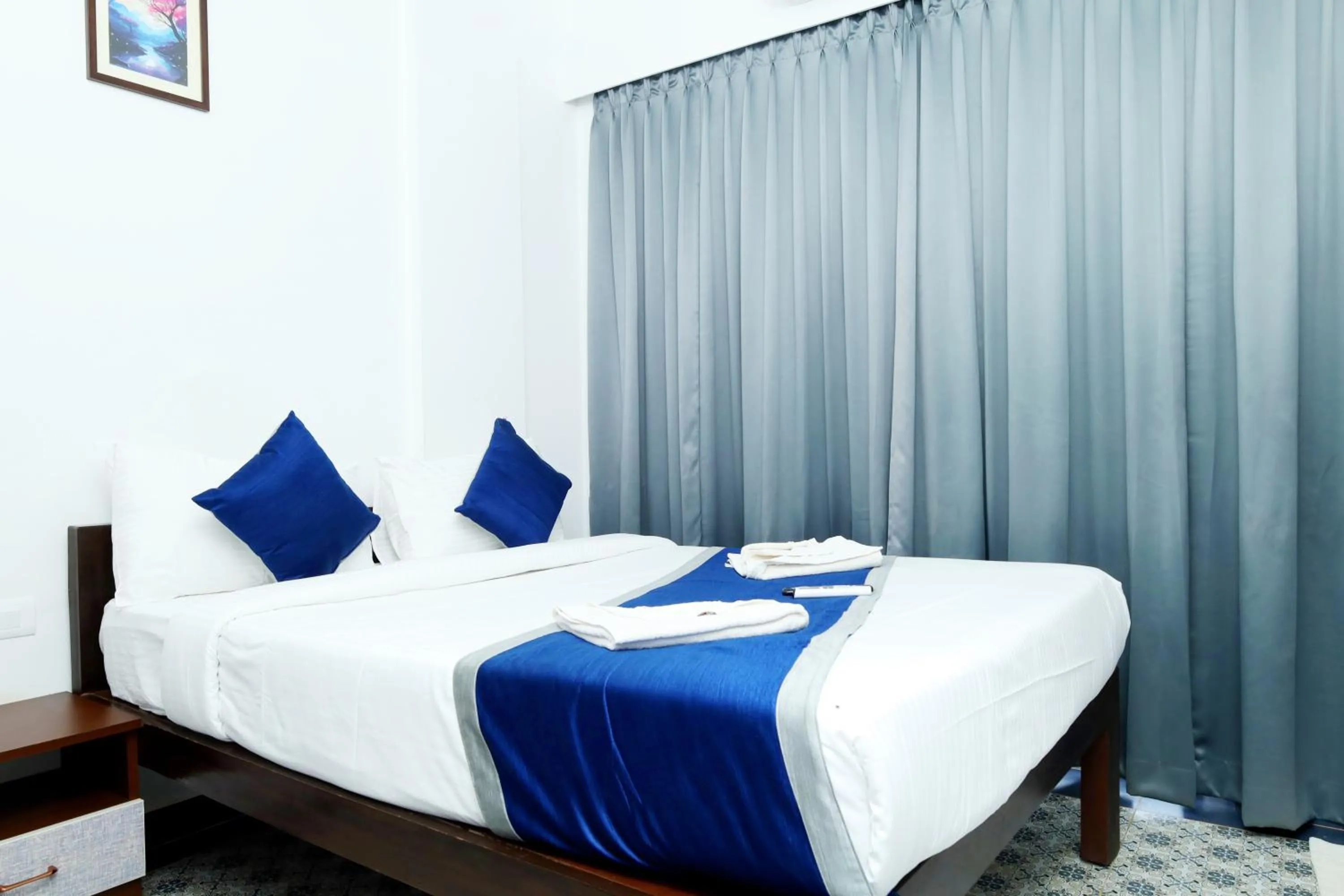 Photo of the whole room, Bed in Felix Inn - Manyata Tech Park