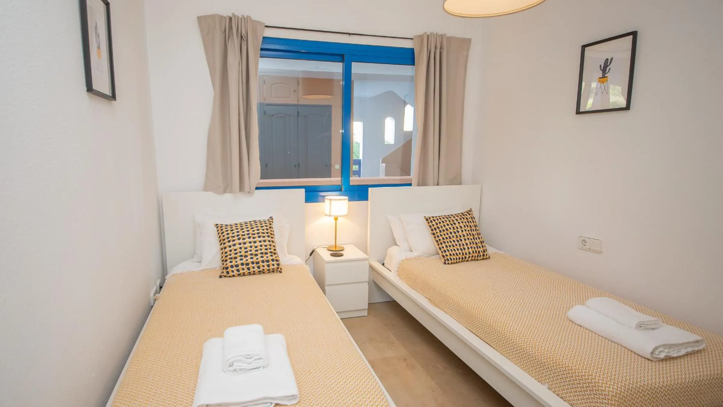 Bed in Duquesa Suites 206