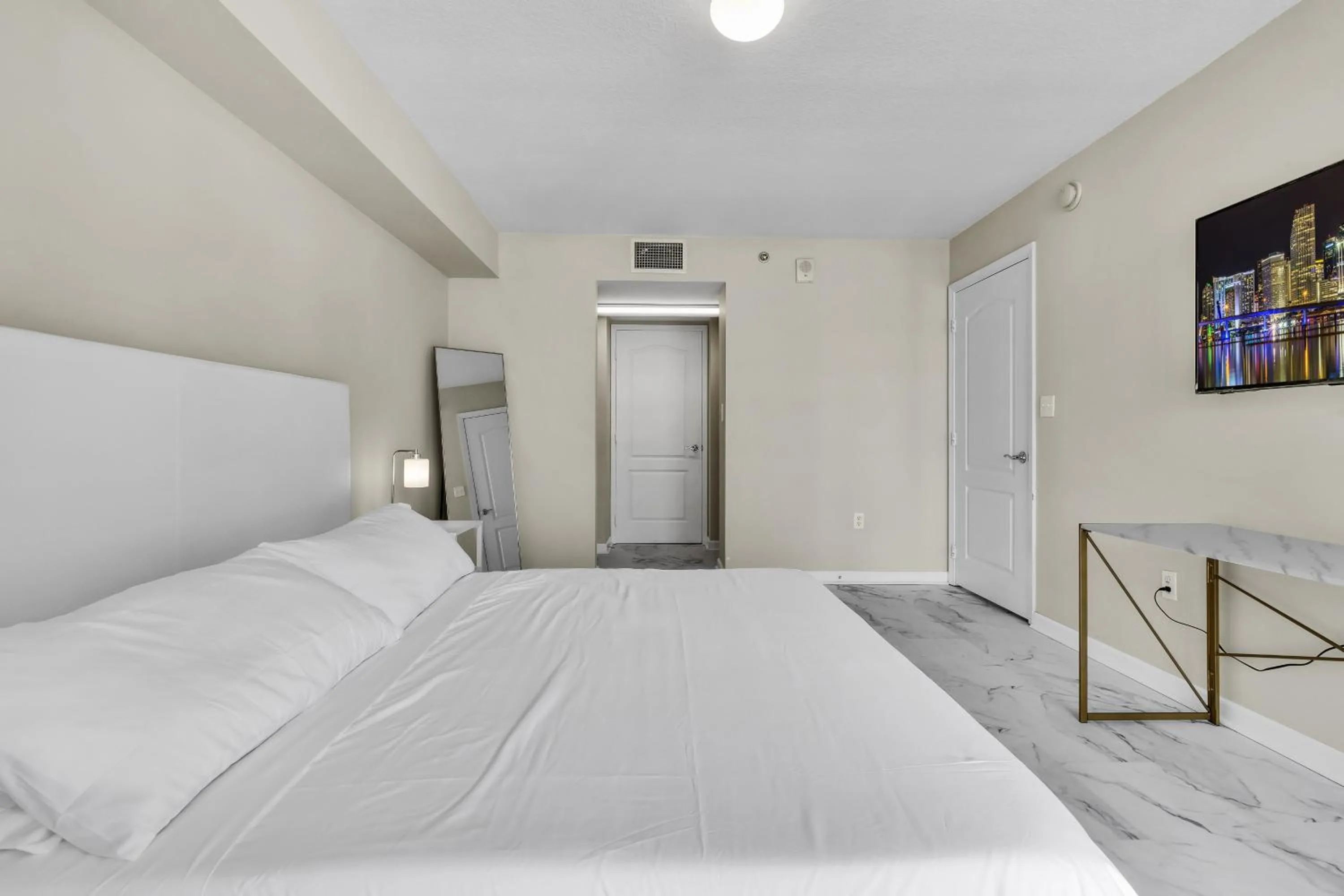 Bed in The Club at Brickell Bay Luxury Suites