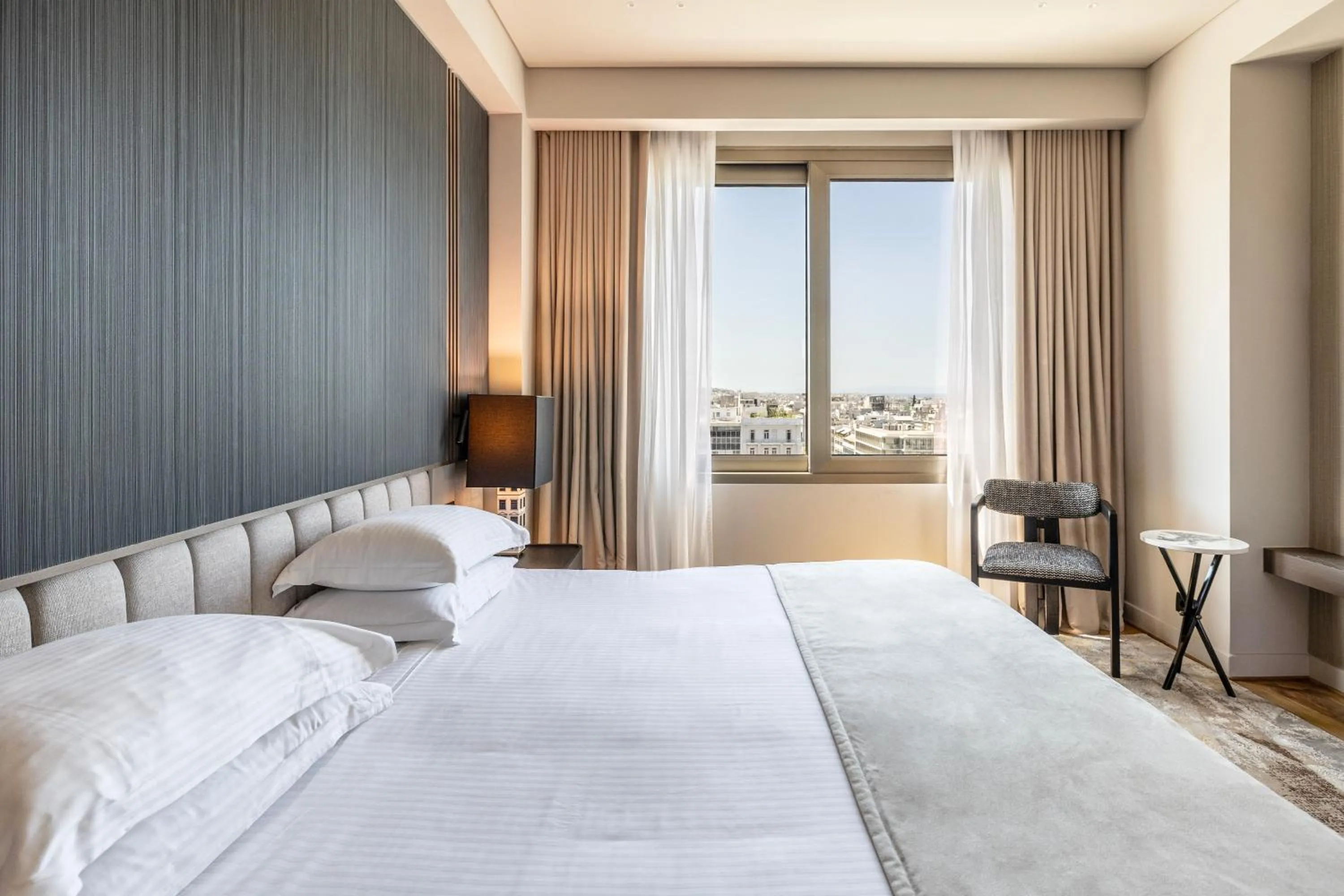 Bed in NJV Athens Plaza