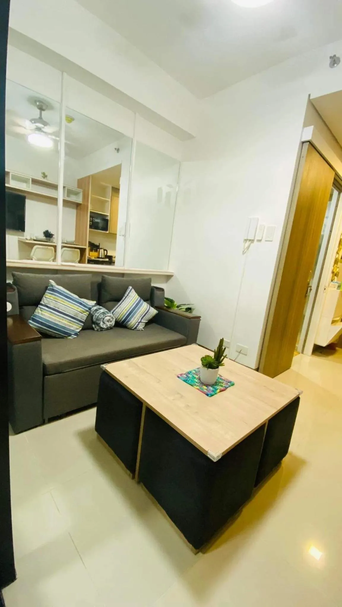Living room in Cozy 1Br with Netflix & Balcony Pool View Condo