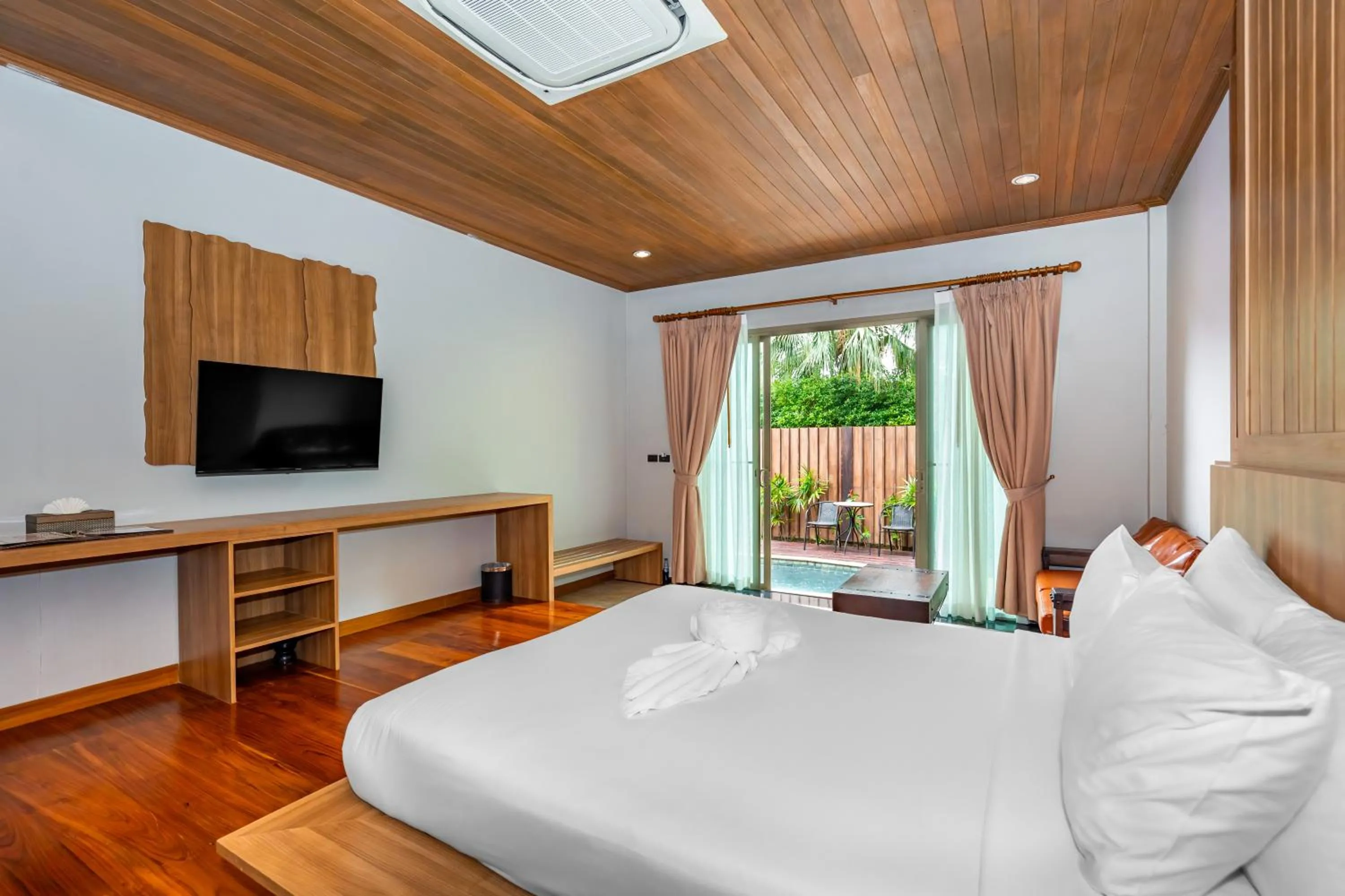 Bed in Malabar Pool Villa Phuket