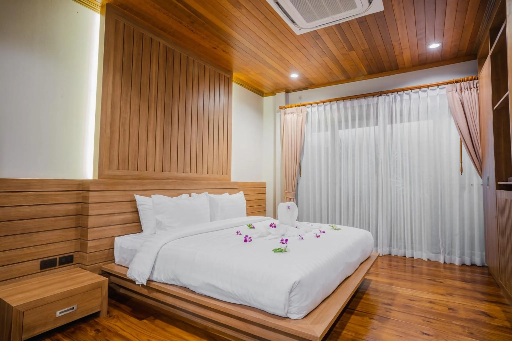 Bed in Malabar Pool Villa Phuket