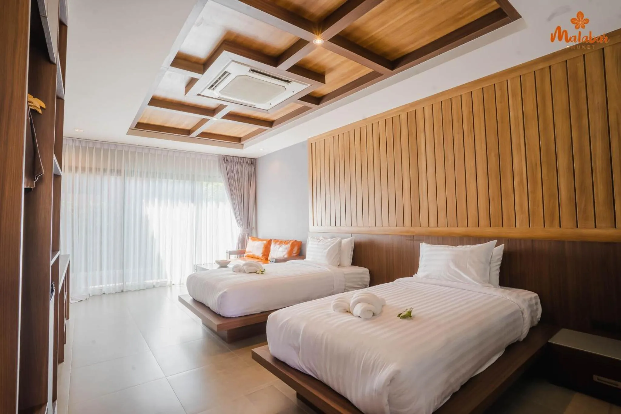 Bed in Malabar Pool Villa Phuket