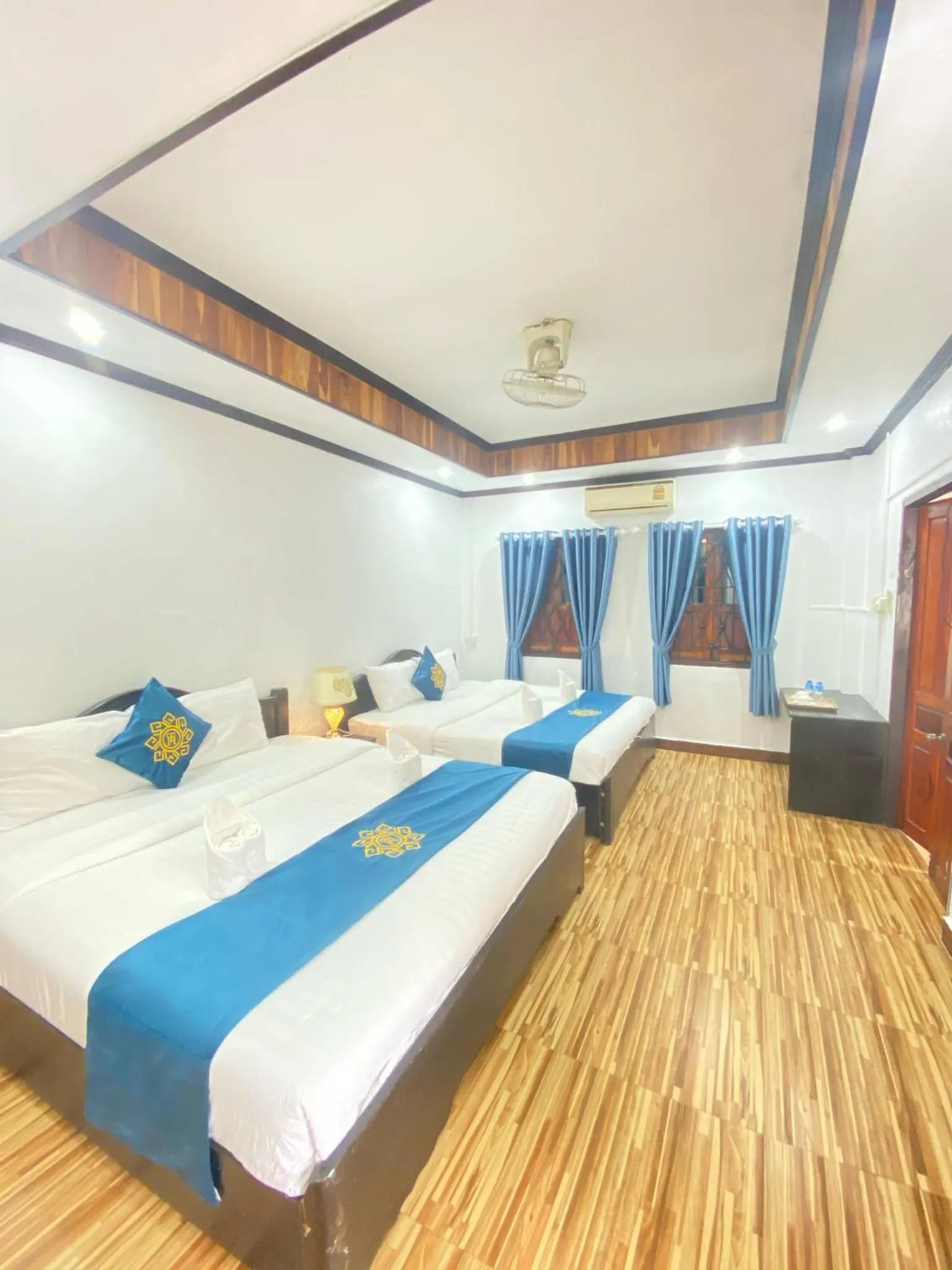 Bed in Singharat Boutique House