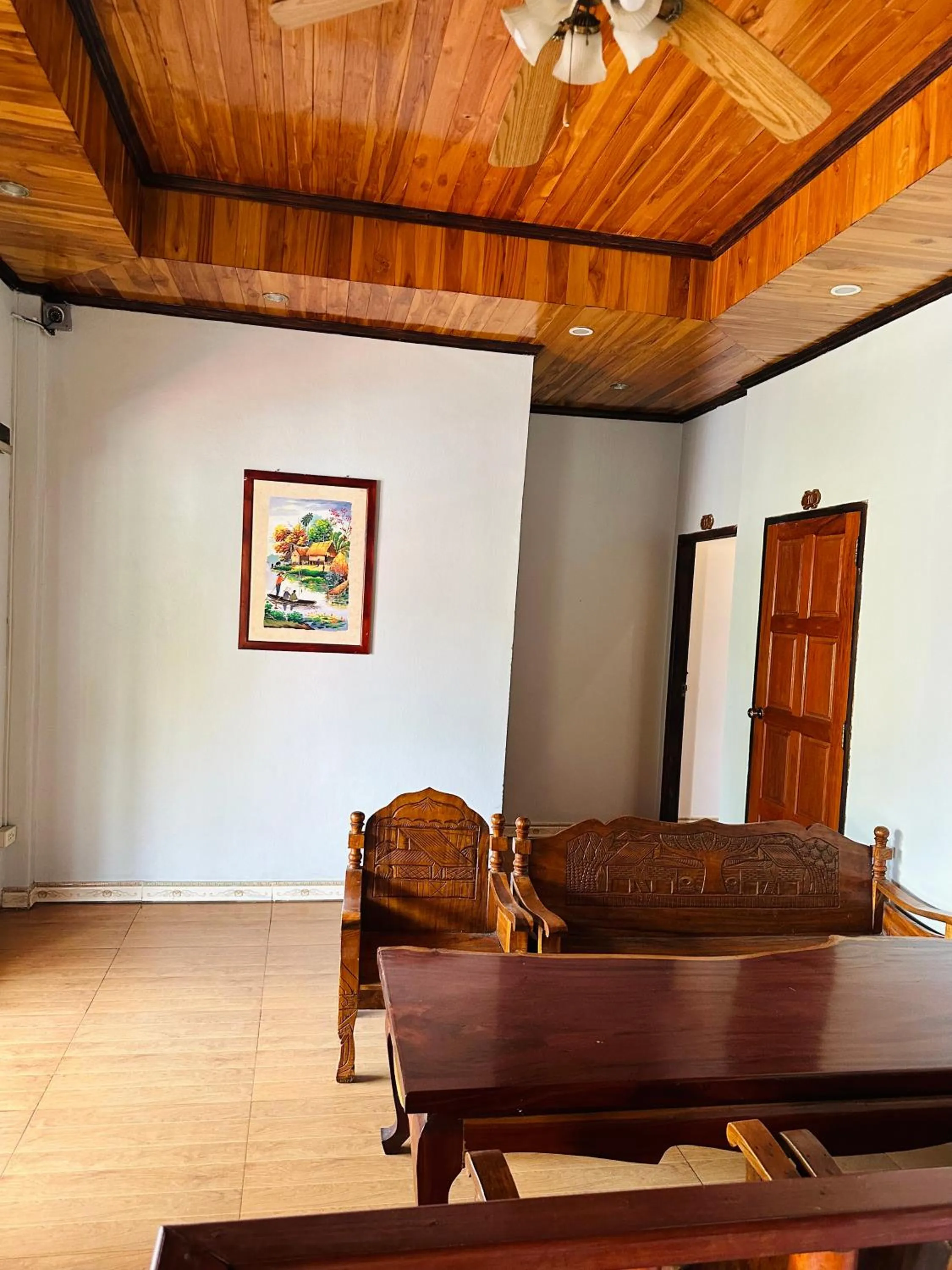 Seating area in Singharat Boutique House