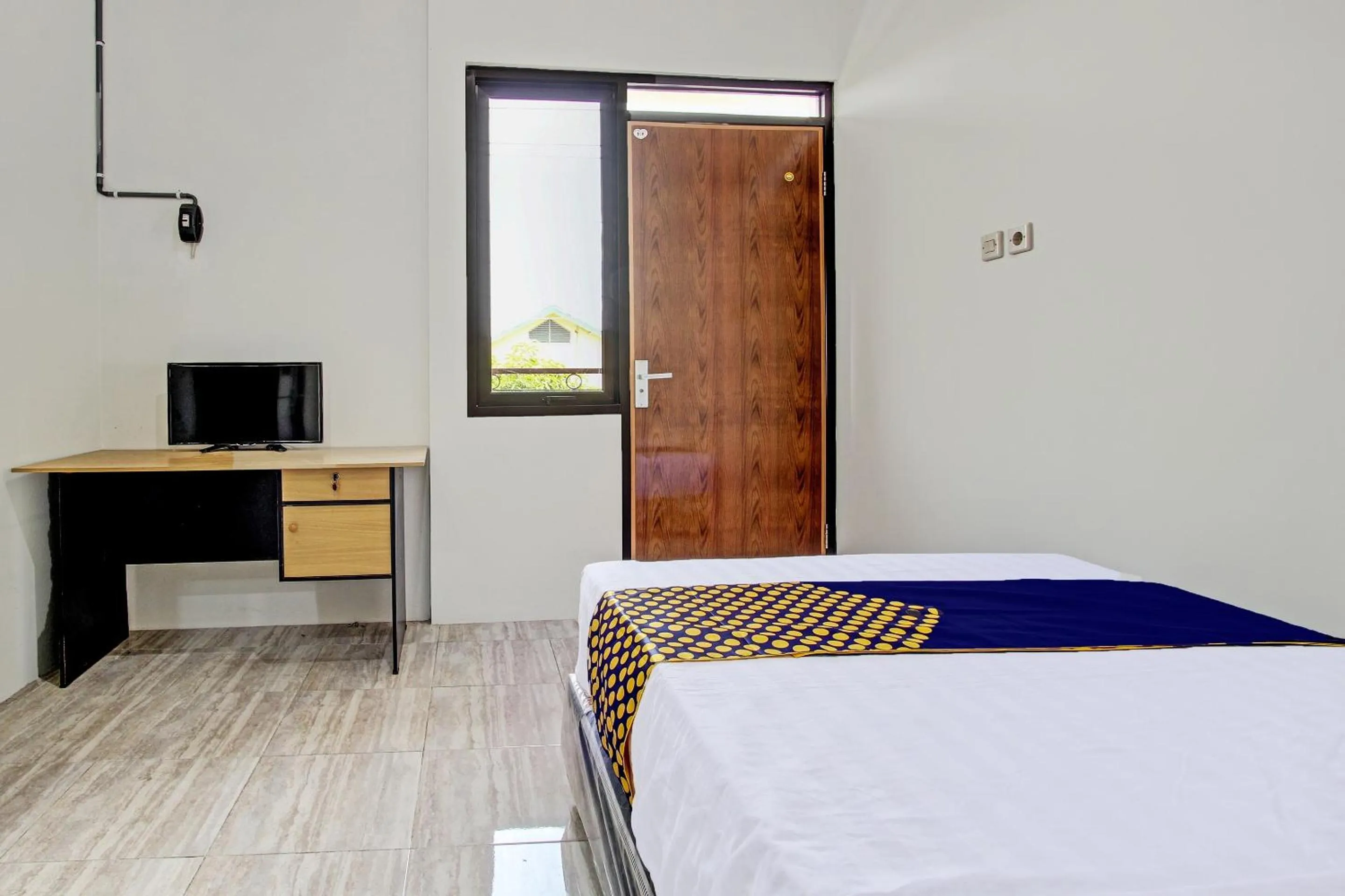 Bedroom, Bed in Hotel O Kristin Homestay