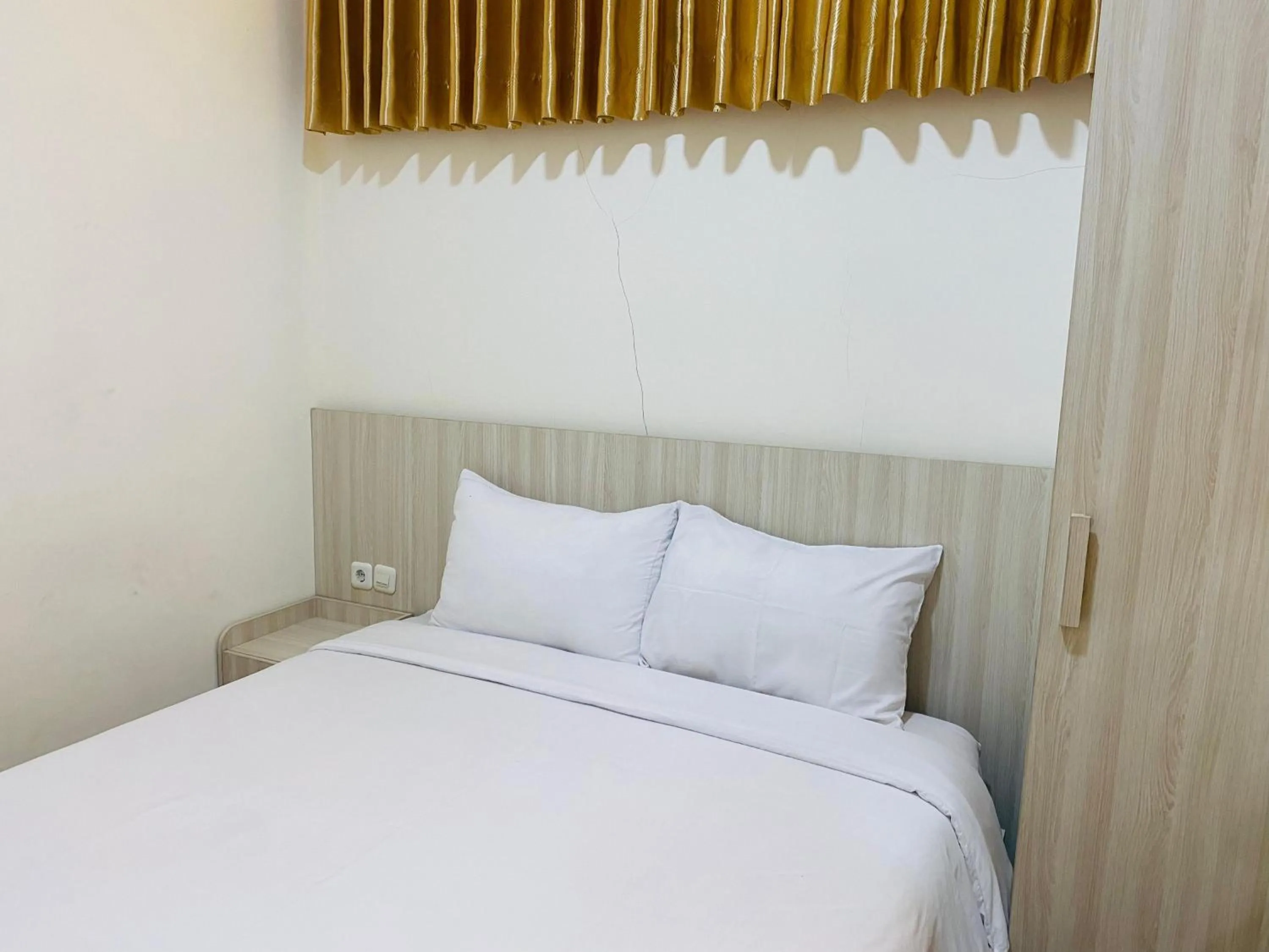 Bedroom, Bed in Kanggo Riko Family Homestay Mitra Reddoorz