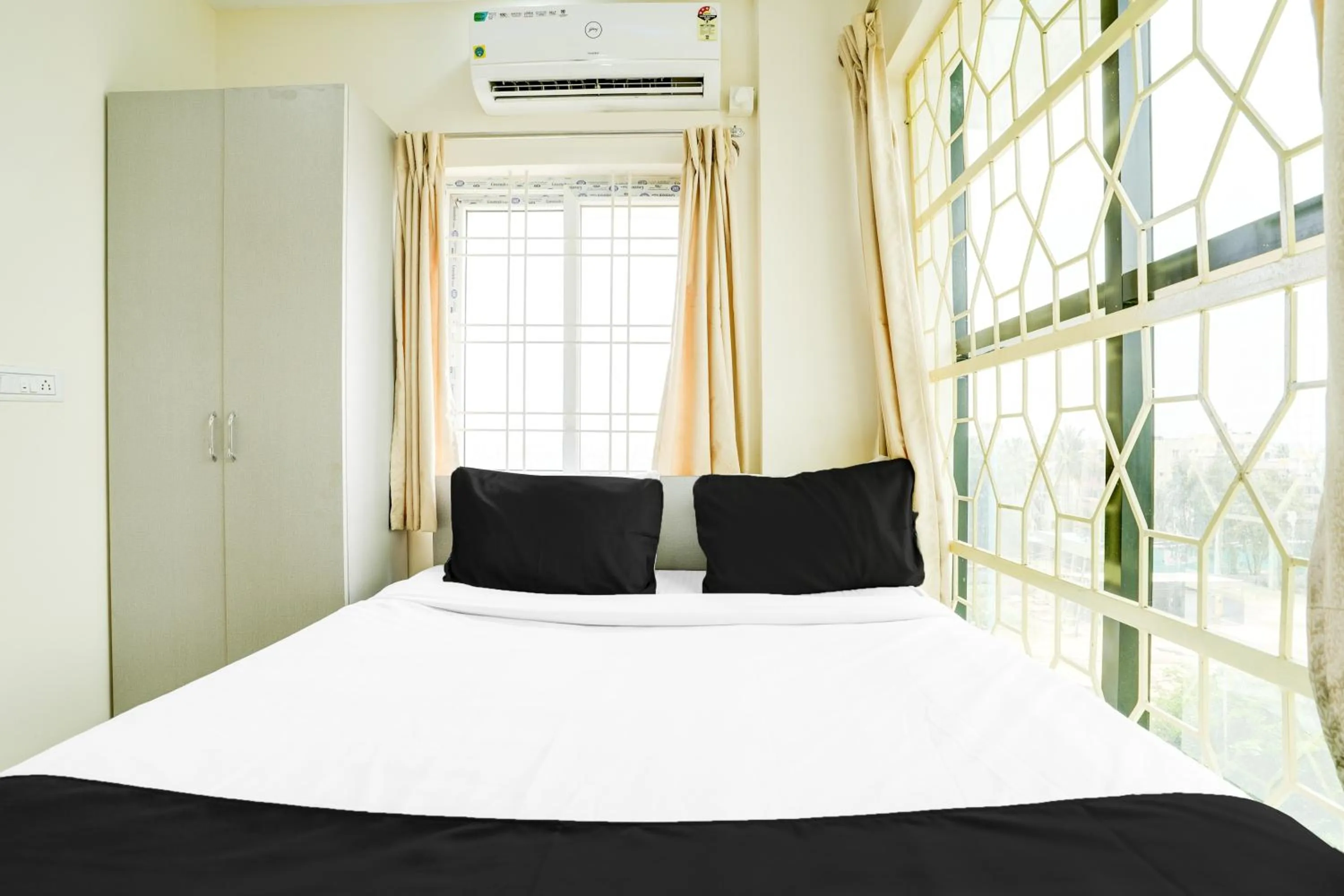 Bedroom, Bed in Hotel O Bangalore Near Reva Circle Formerly CKA Boarding