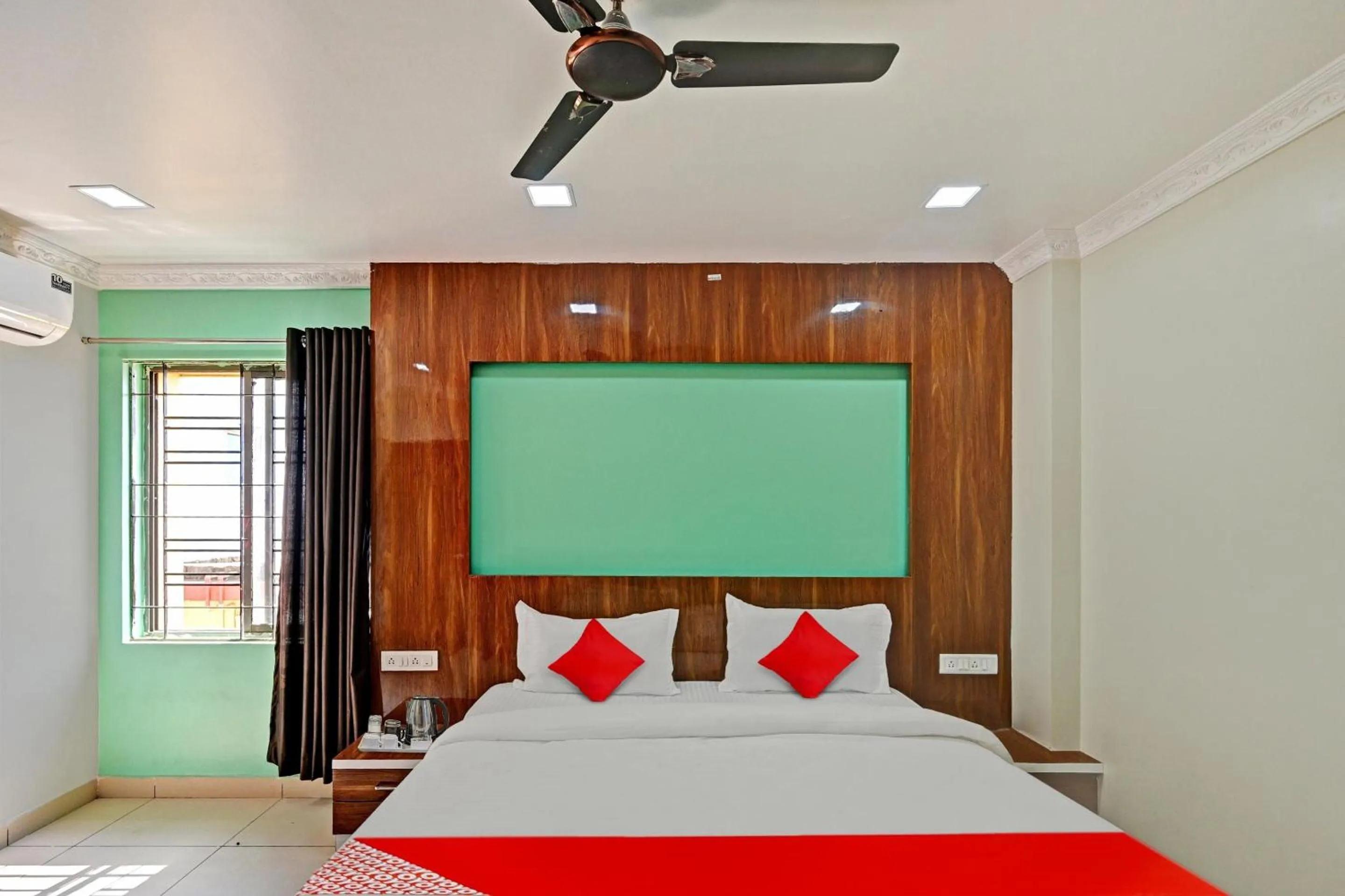 Bedroom in Hotel O Hi5 Days Inn Premium