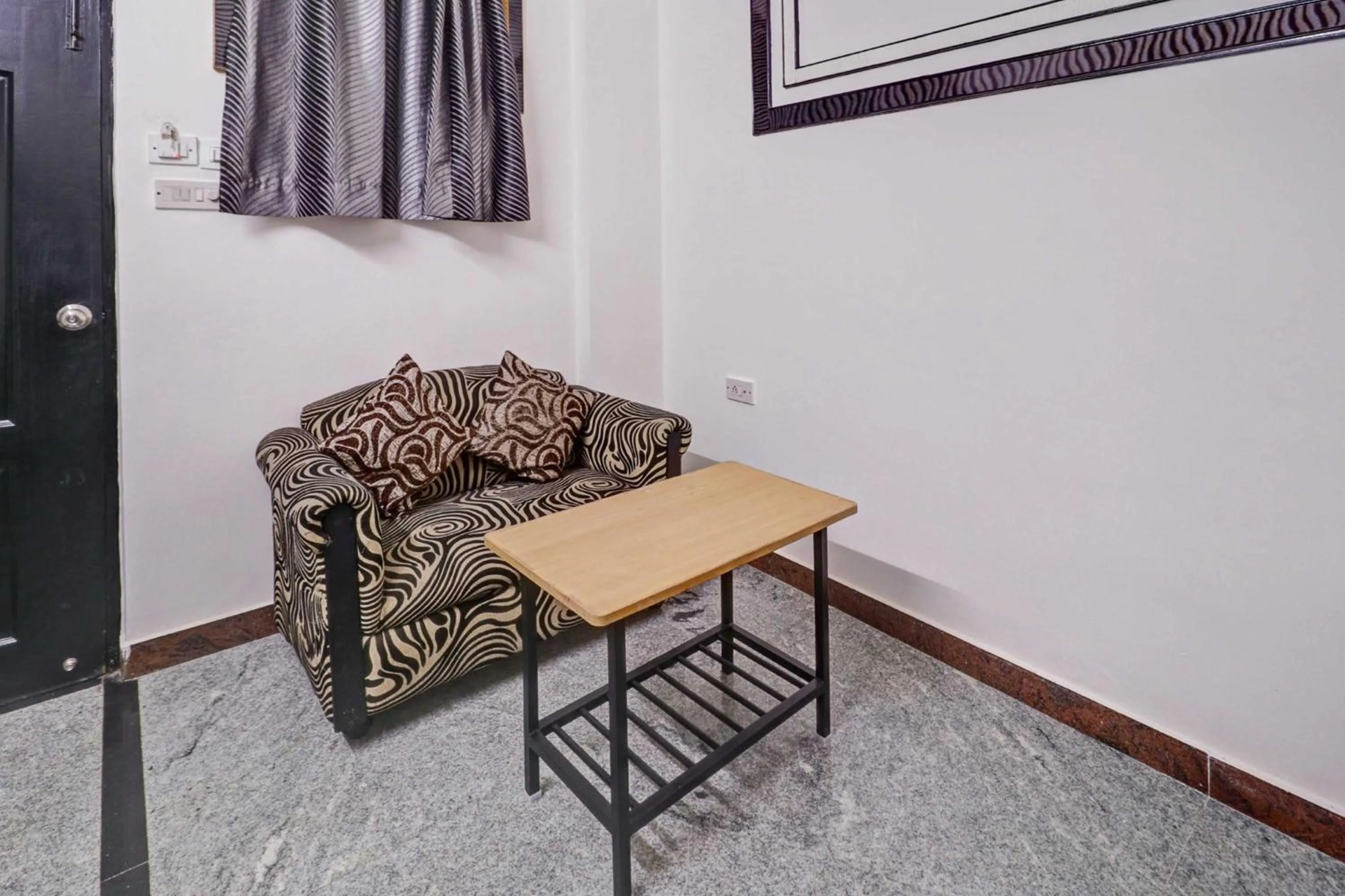 Living room in Super Collection O Sabharwal Residency Near Lalbagh Botanical Garden