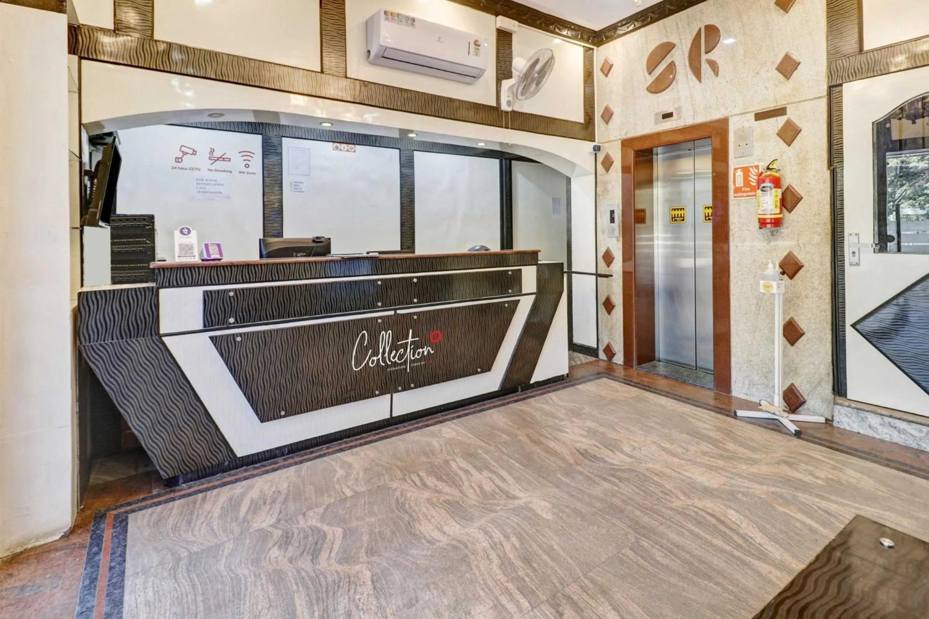 Lobby or reception in Super Collection O Sabharwal Residency Near Lalbagh Botanical Garden