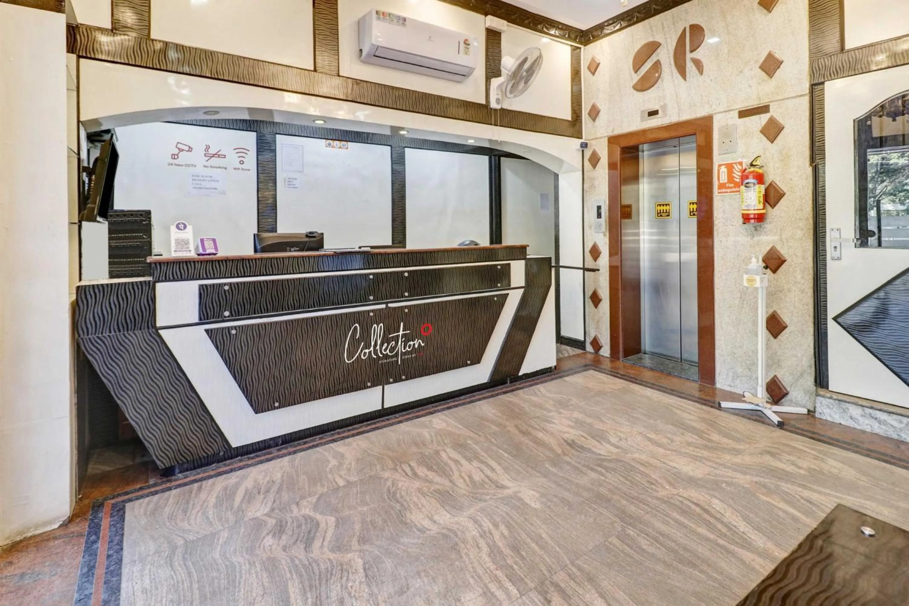 Lobby or reception in Super Collection O Sabharwal Residency Near Lalbagh Botanical Garden