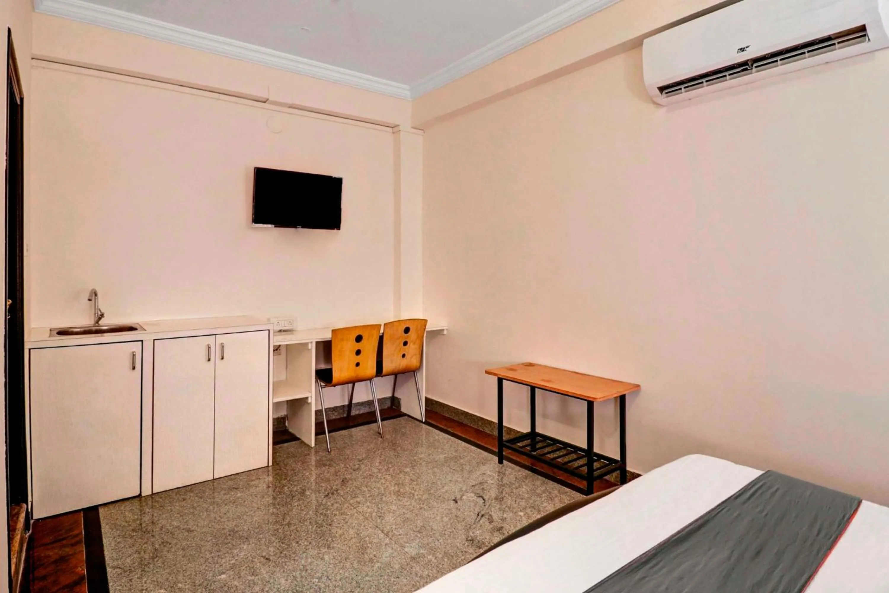 Bedroom in Super Collection O Sabharwal Residency Near Lalbagh Botanical Garden
