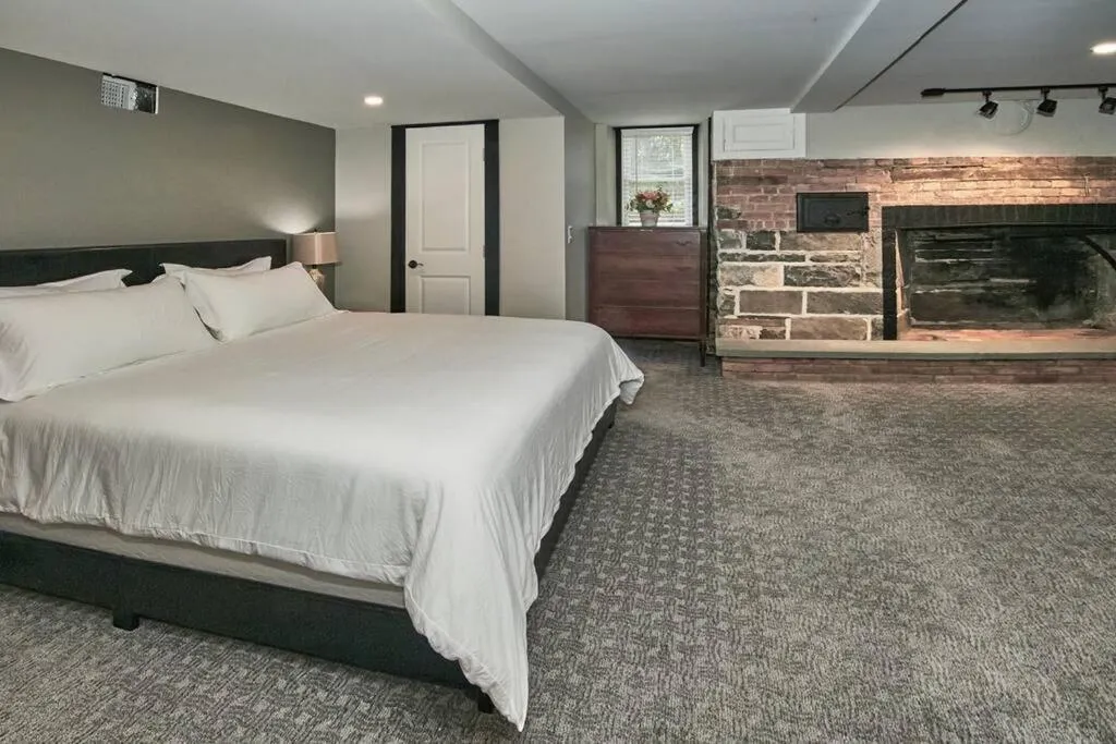 Bed in Craftsman Hideaway at the 1841 Farmhouse