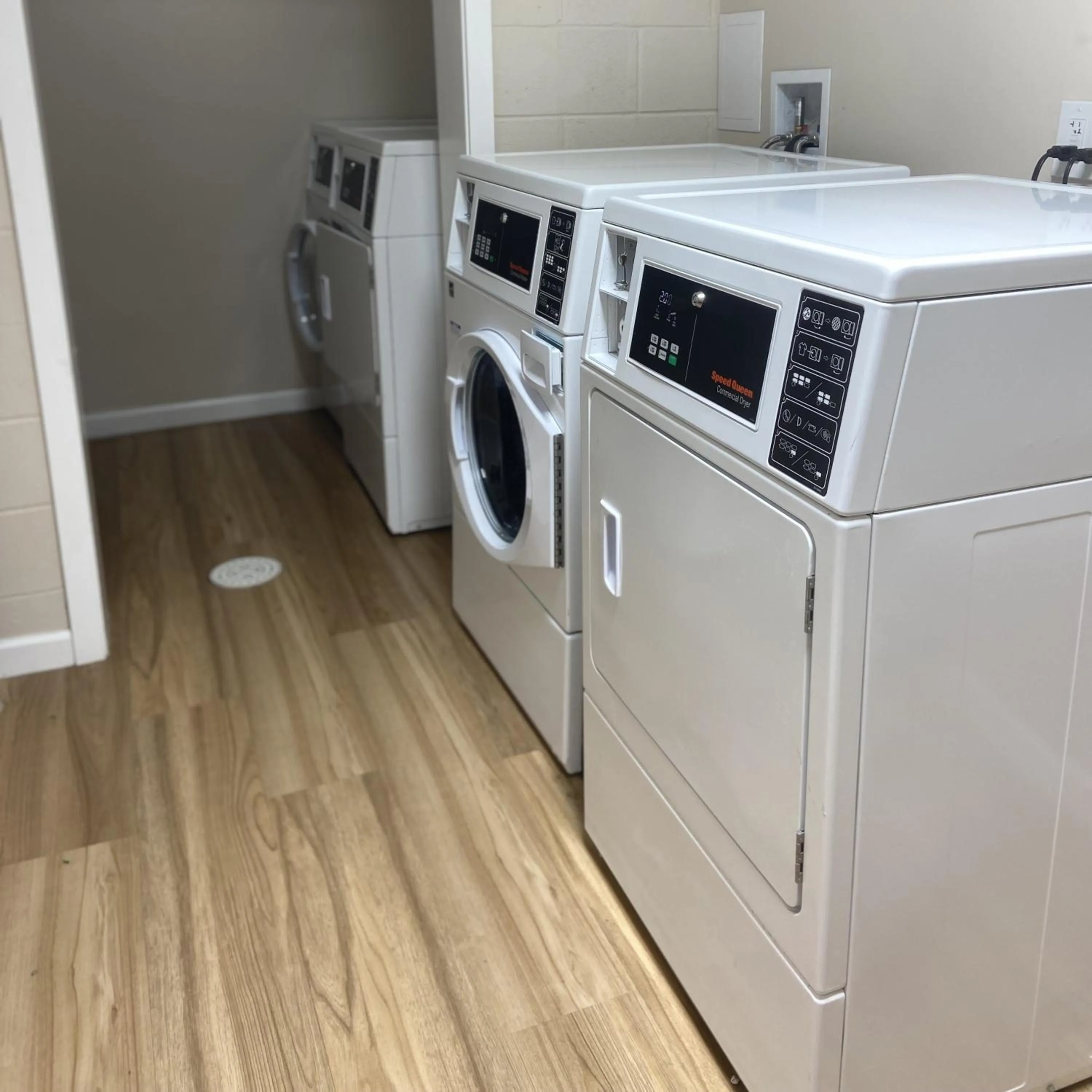 laundry in HomeTowne Studios by Red Roof Painted Post